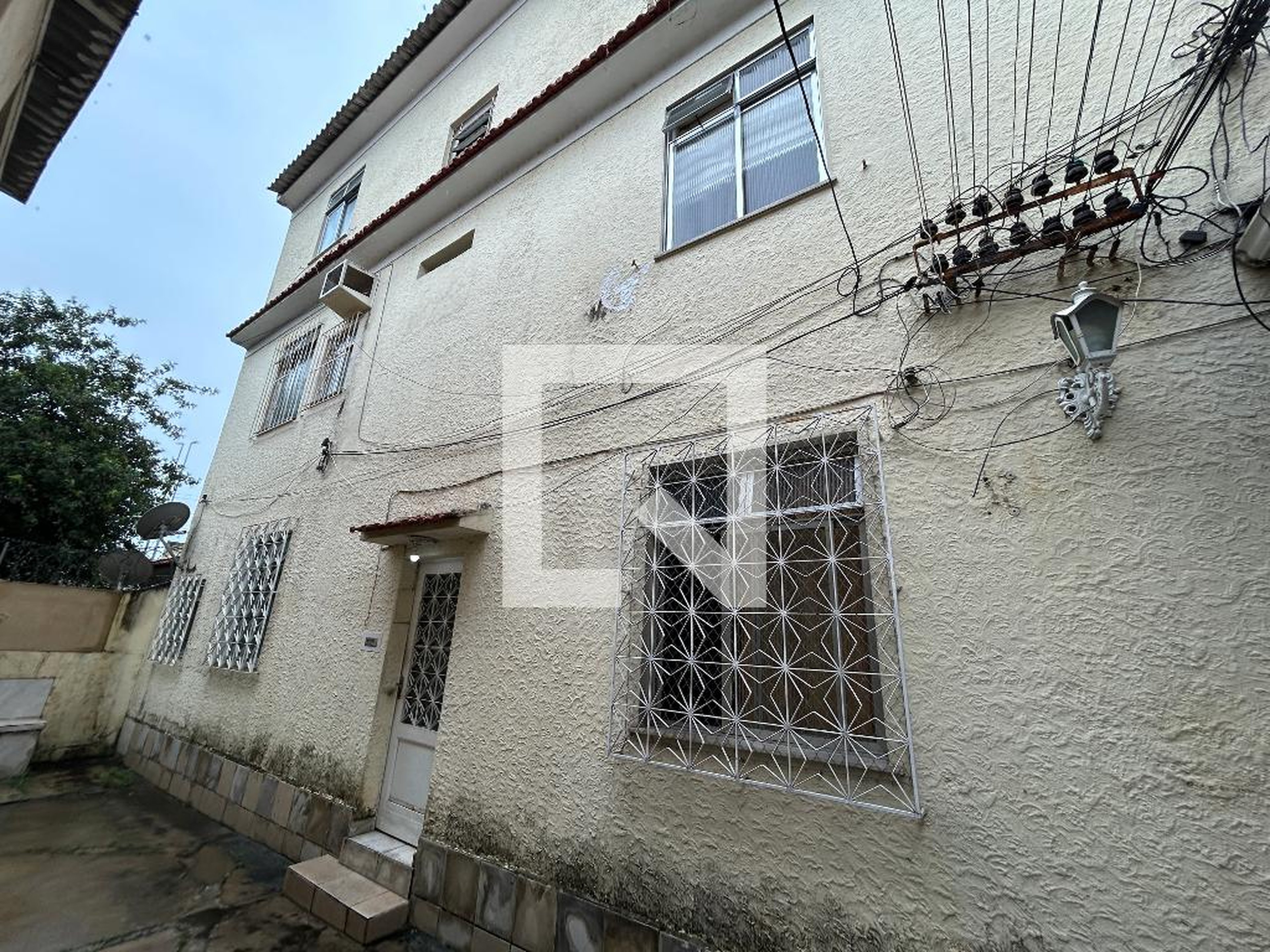 Fachada Condomínio em Rua Washington de Azevedo, 114