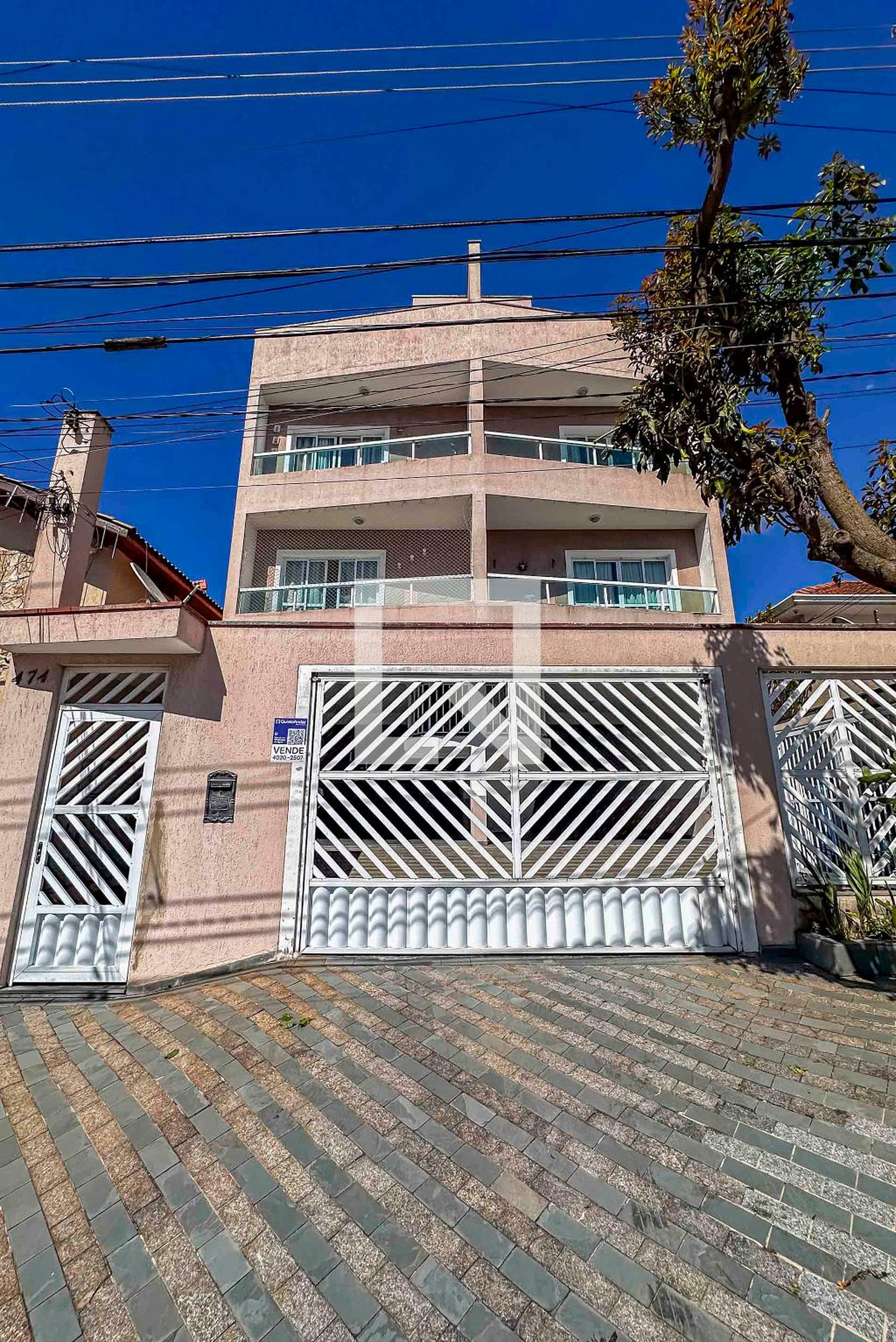 Fachada Condomínio em Rua Coroados, 474