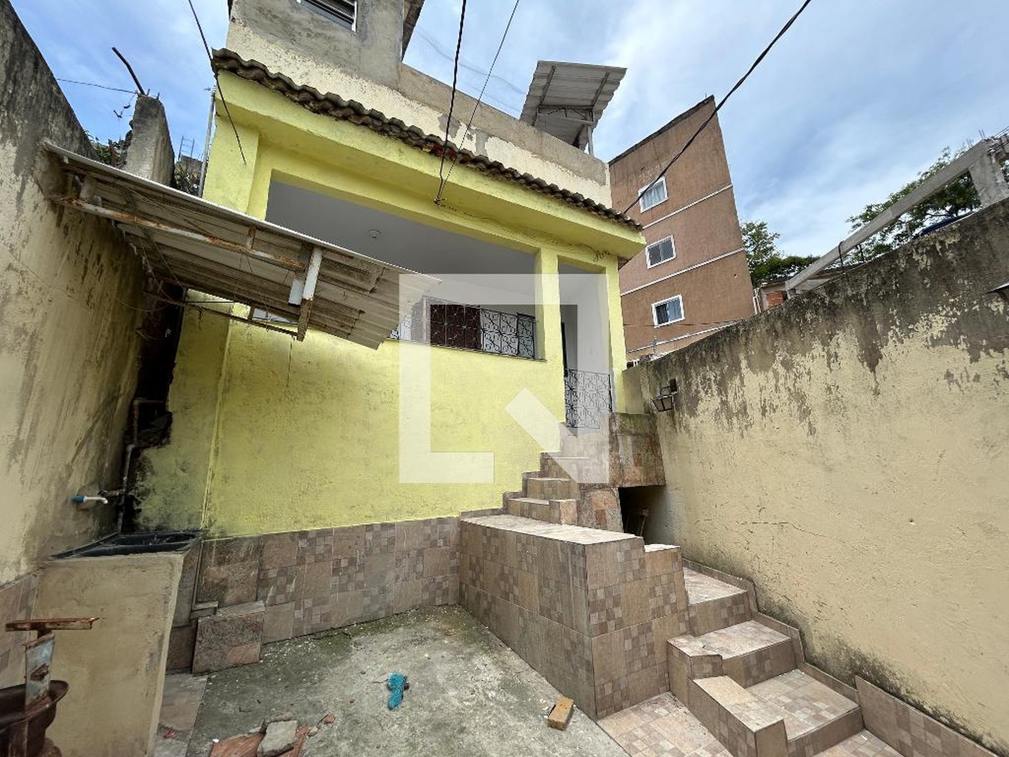 Fachada Condomínio em Rua Arauana, 41