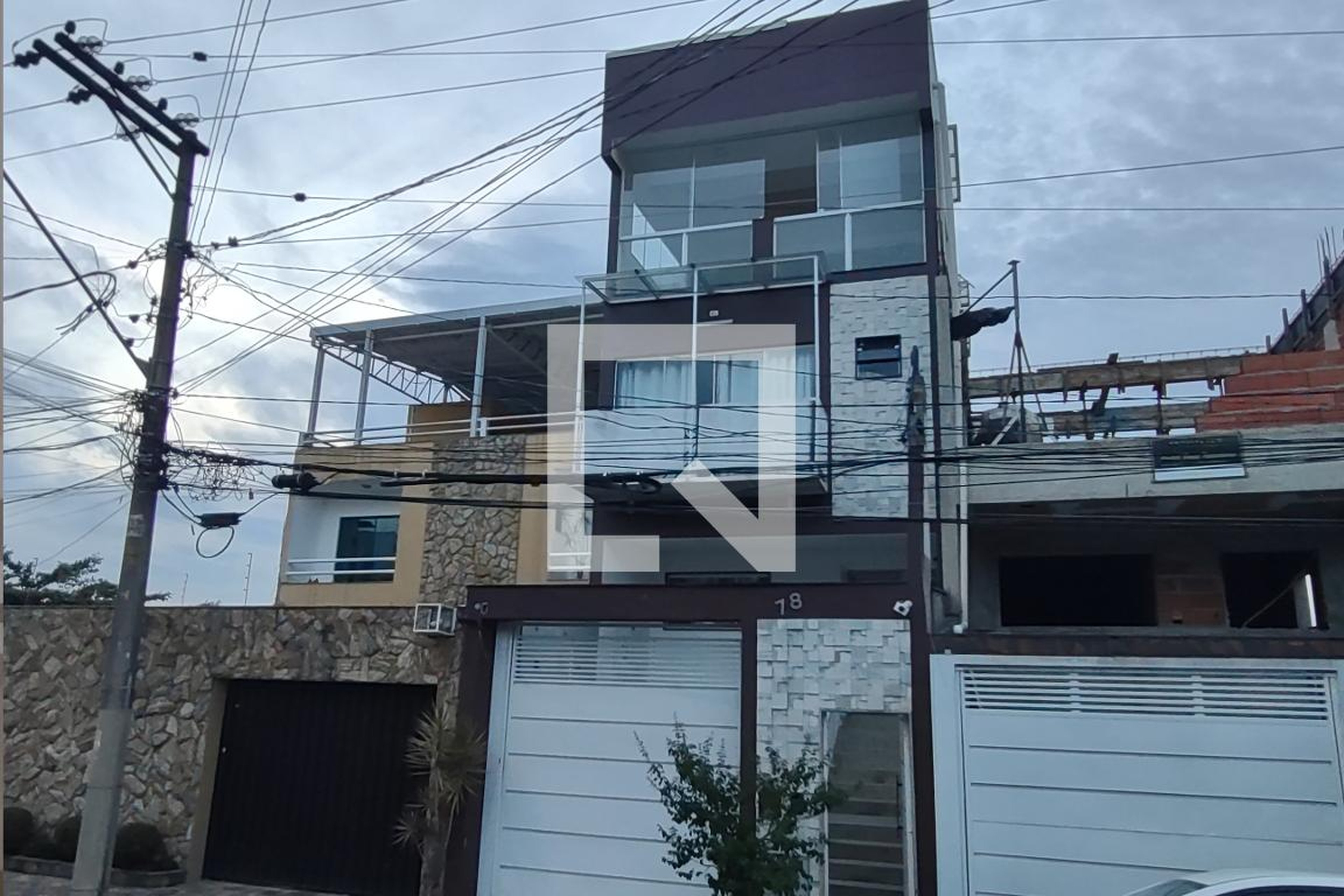 Fachada Condomínio em Rua Tupi, 78