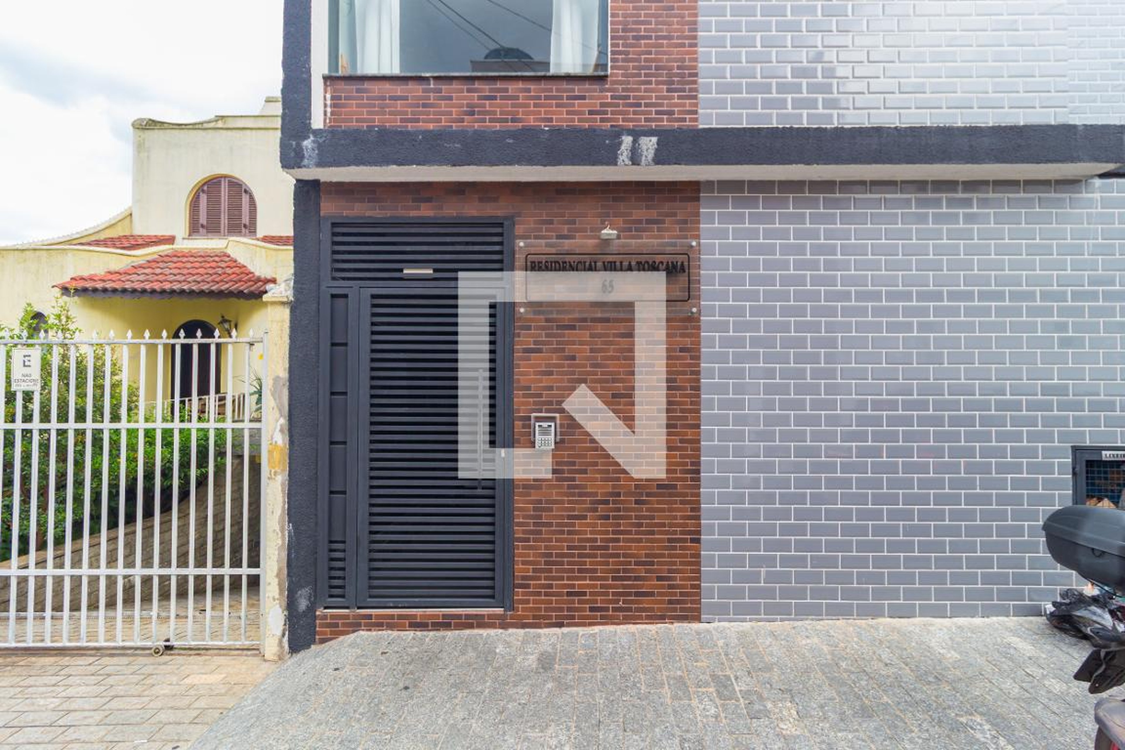 Fachada Condomínio Villa Toscana