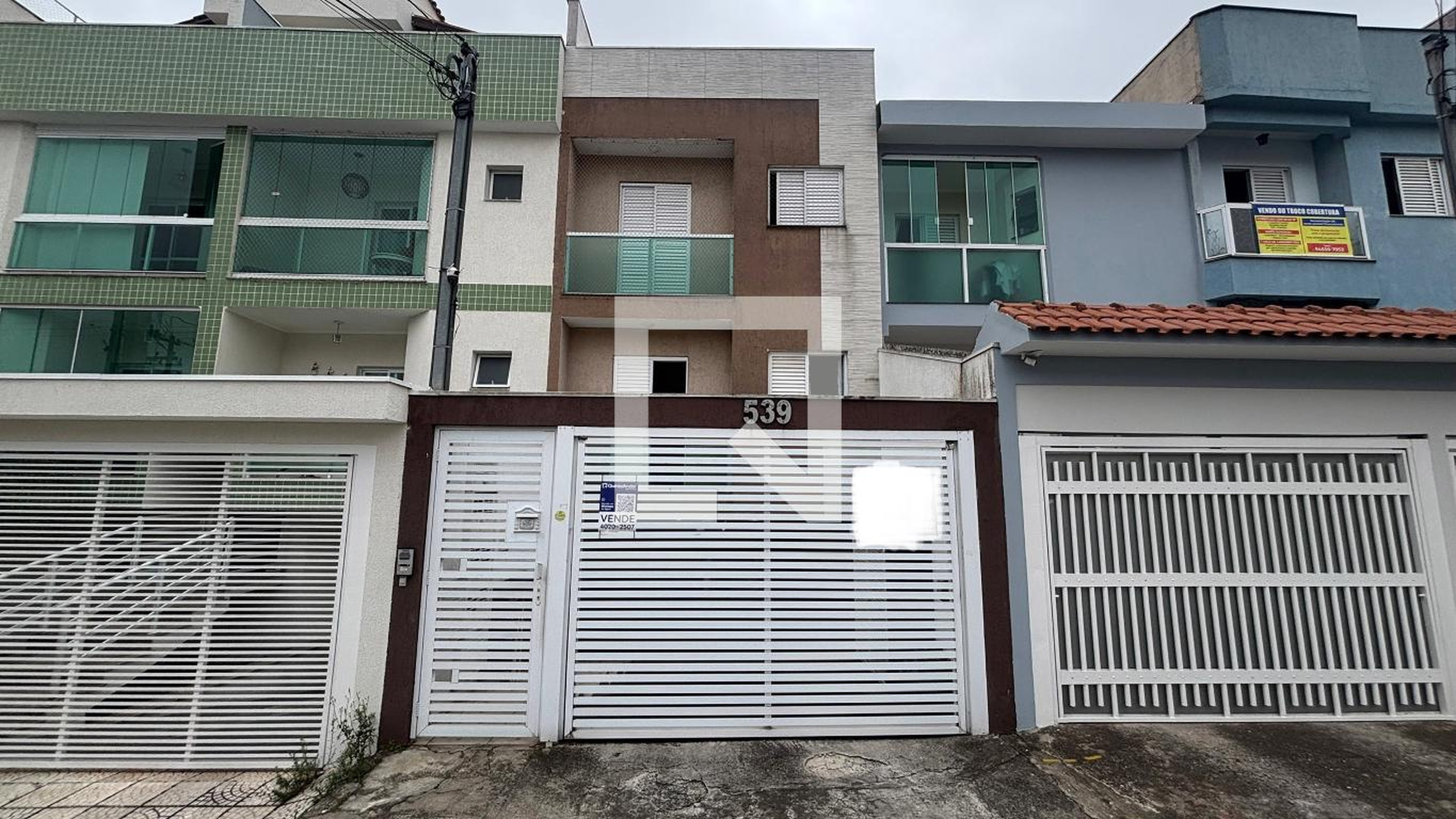 Fachada Condomínio em Rua Sud Menucci, 539