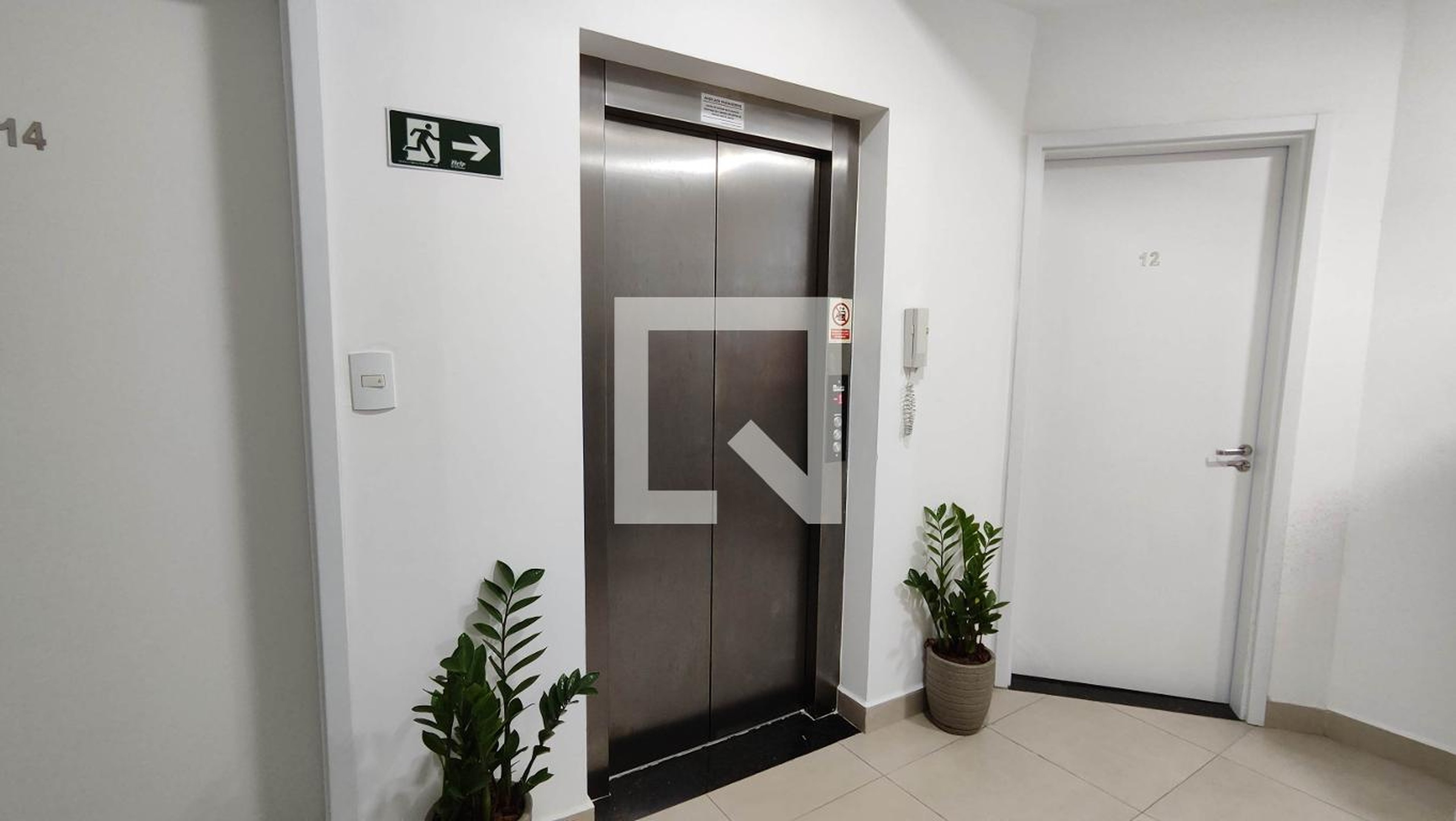 Elevador - Maria Luiza