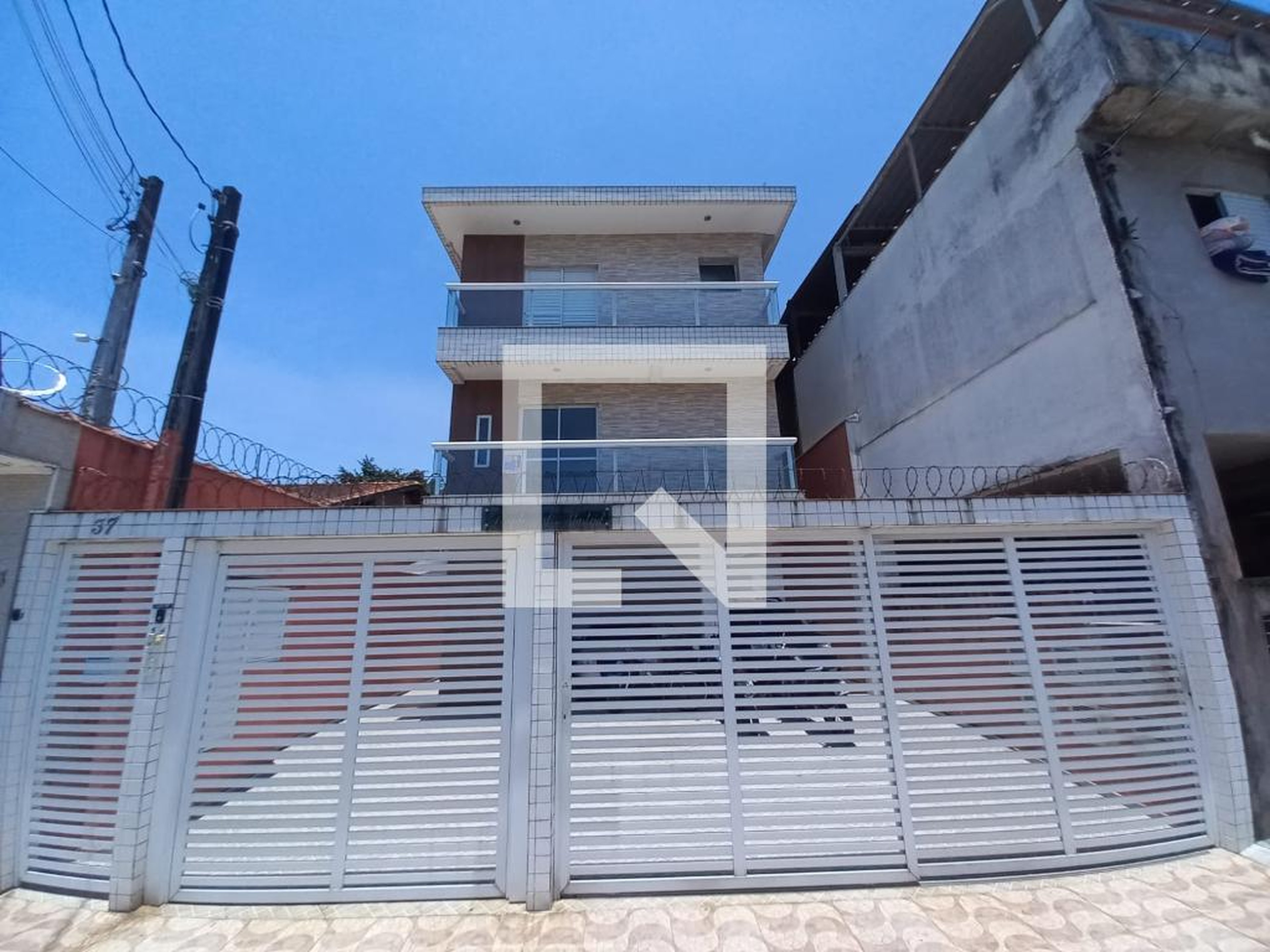 Fachada Condomínio em Rua Dante Cechi, 37