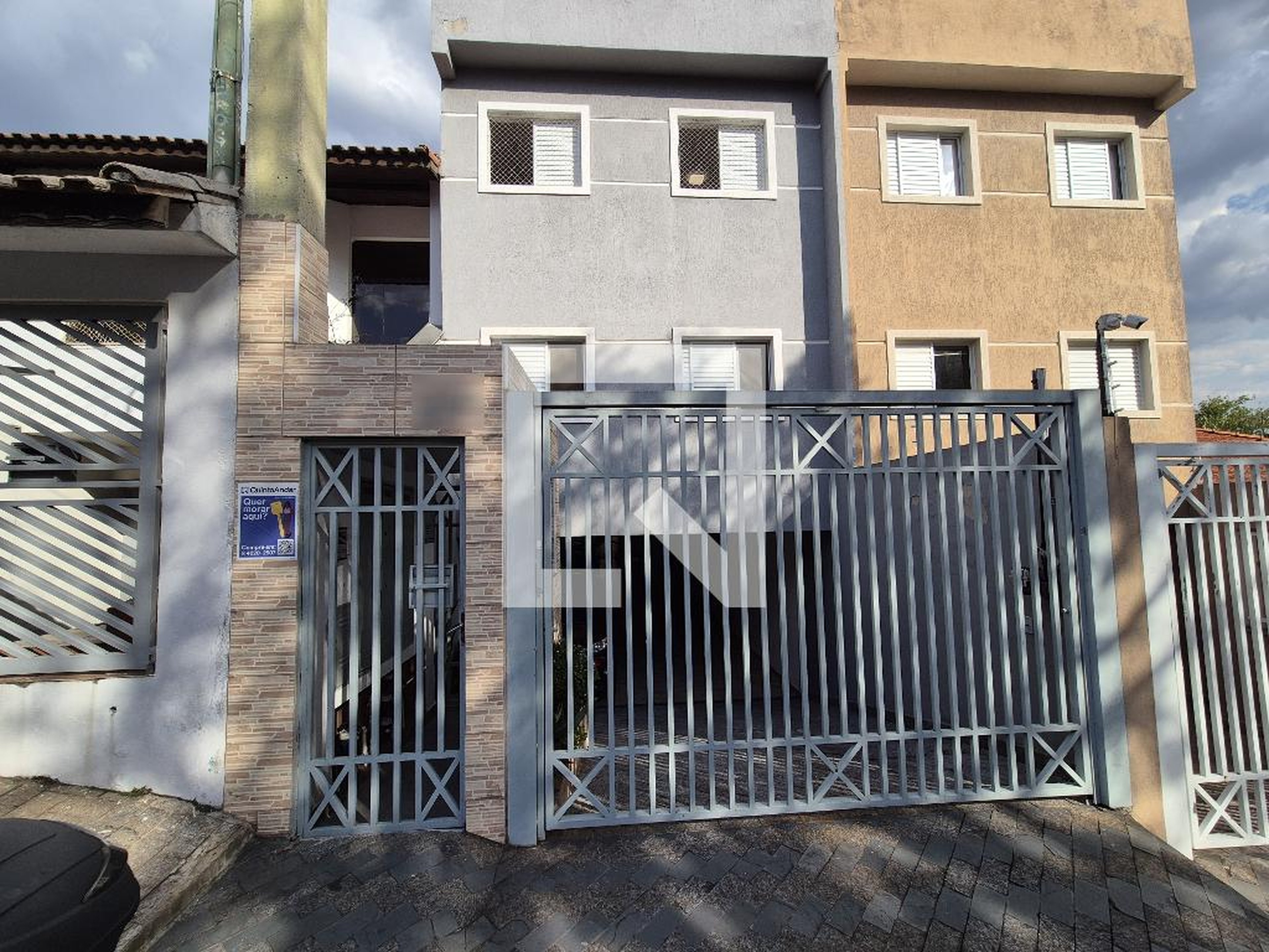 Fachada Condomínio em Rua Miquelina, 382