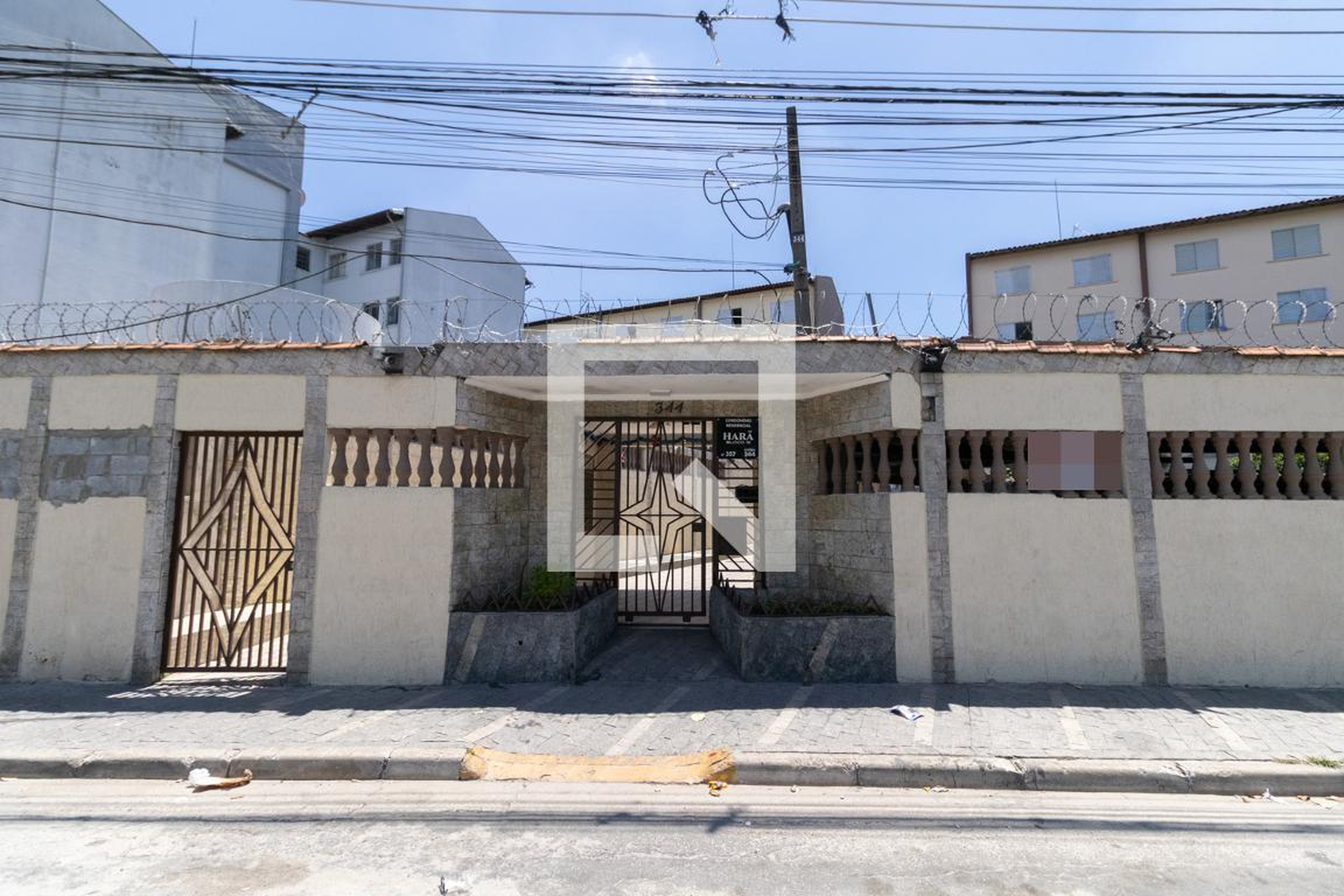 Fachada Condomínio em Rua Marinho Arcanjo dos Santos, 344