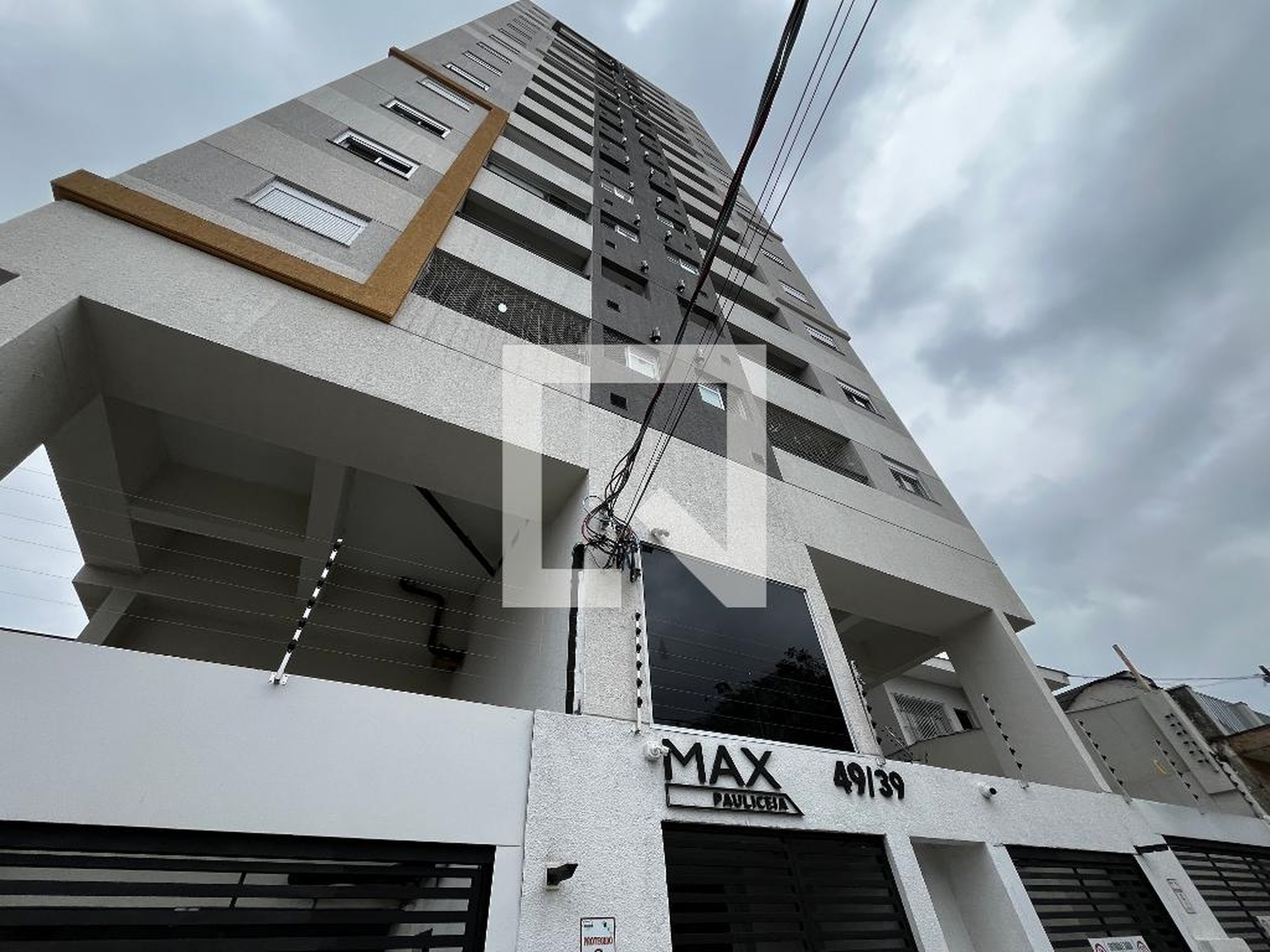 Fachada Condomínio em Rua Júlia Lopes de Almeida, 39