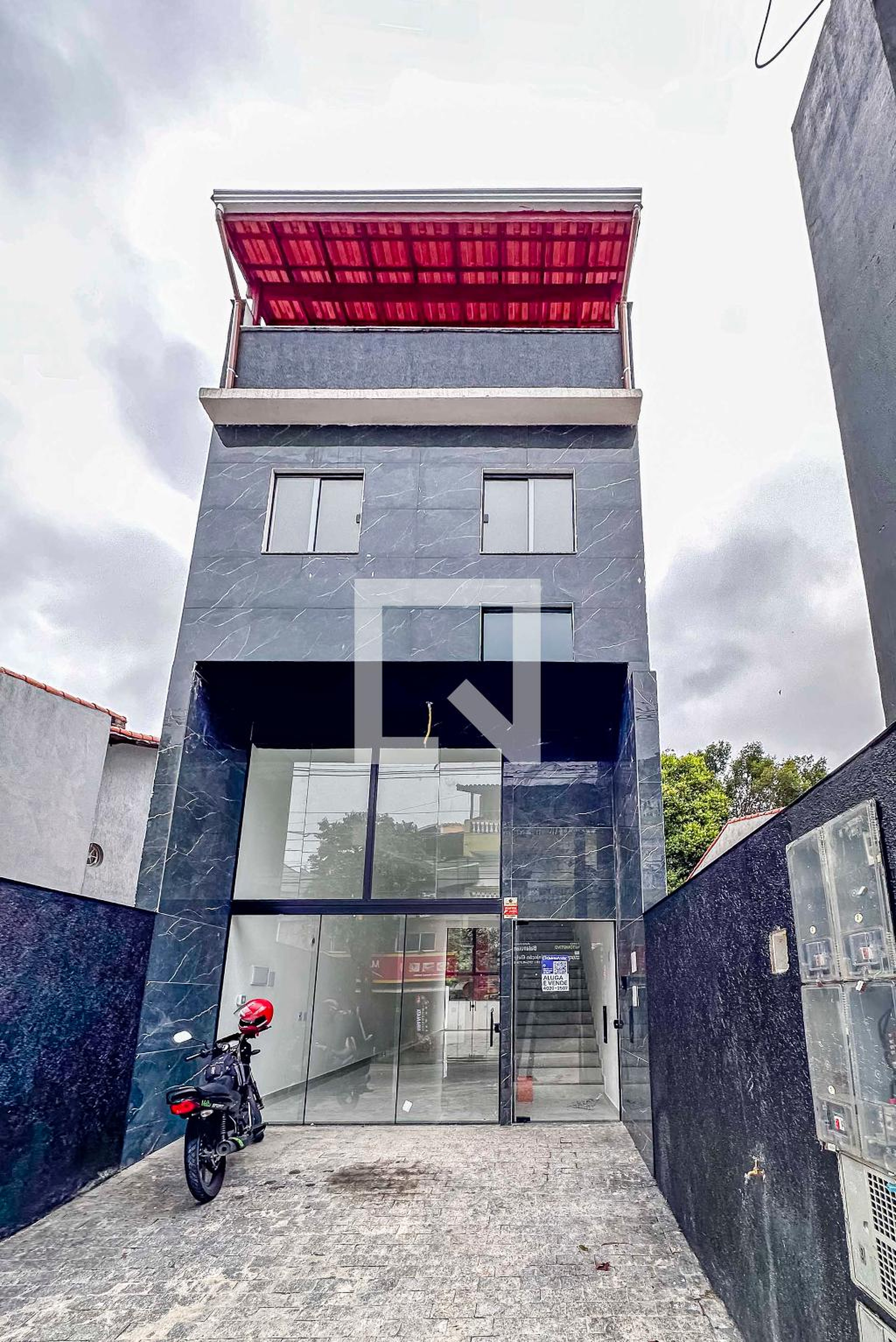 Fachada Condomínio em Rua Colúmbia, 1119