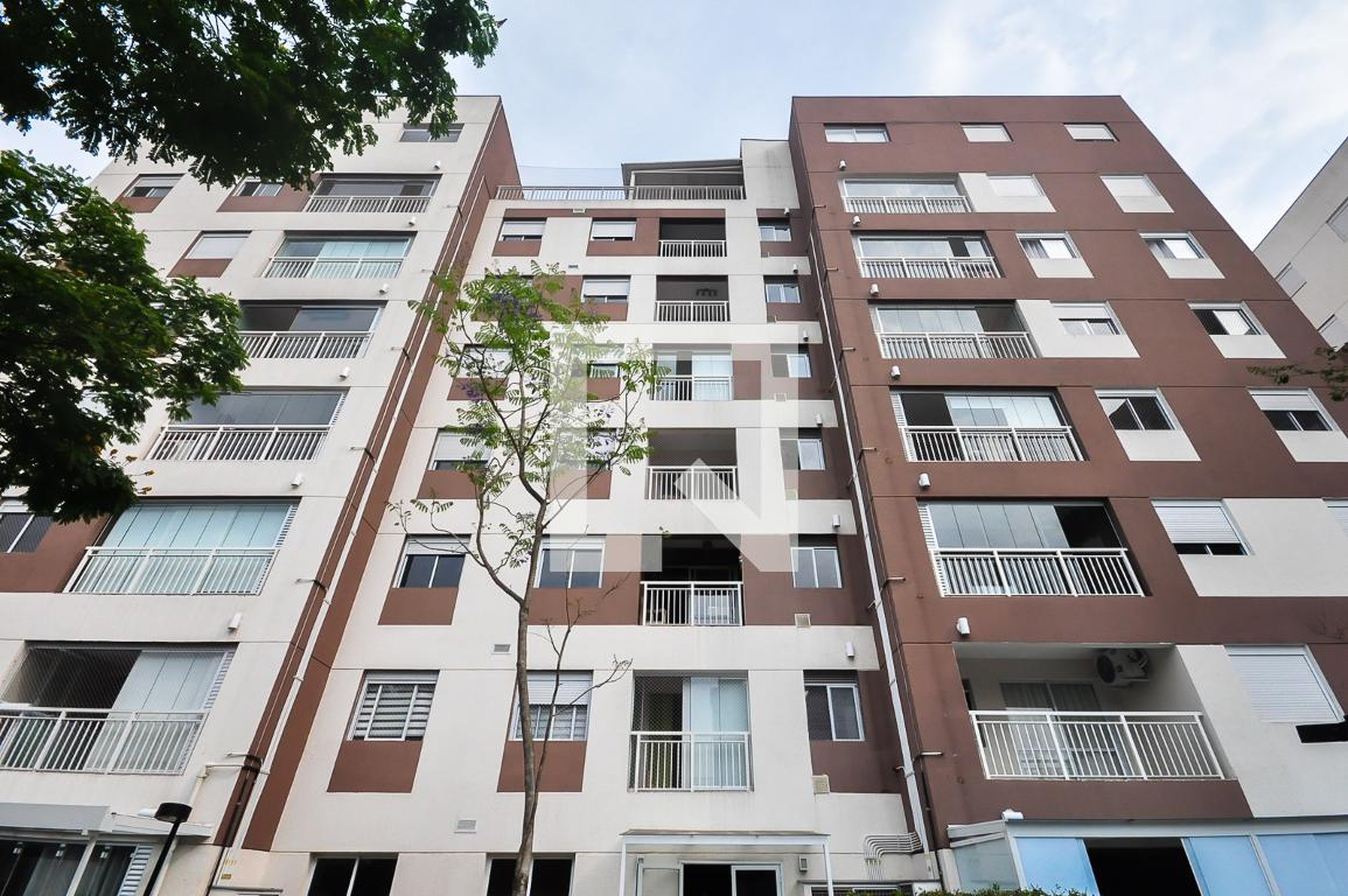 Fachada Condomínio em Rua das Gardênias, 63