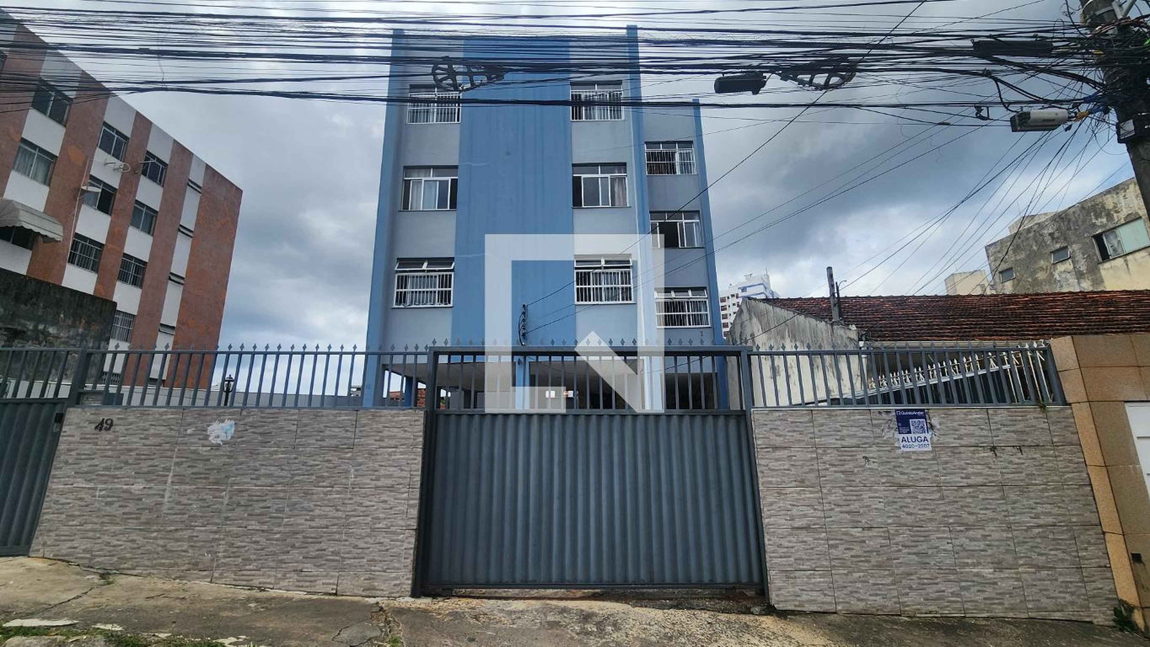 Fachada Condomínio em Rua Professor Alfredo Rocha, 49