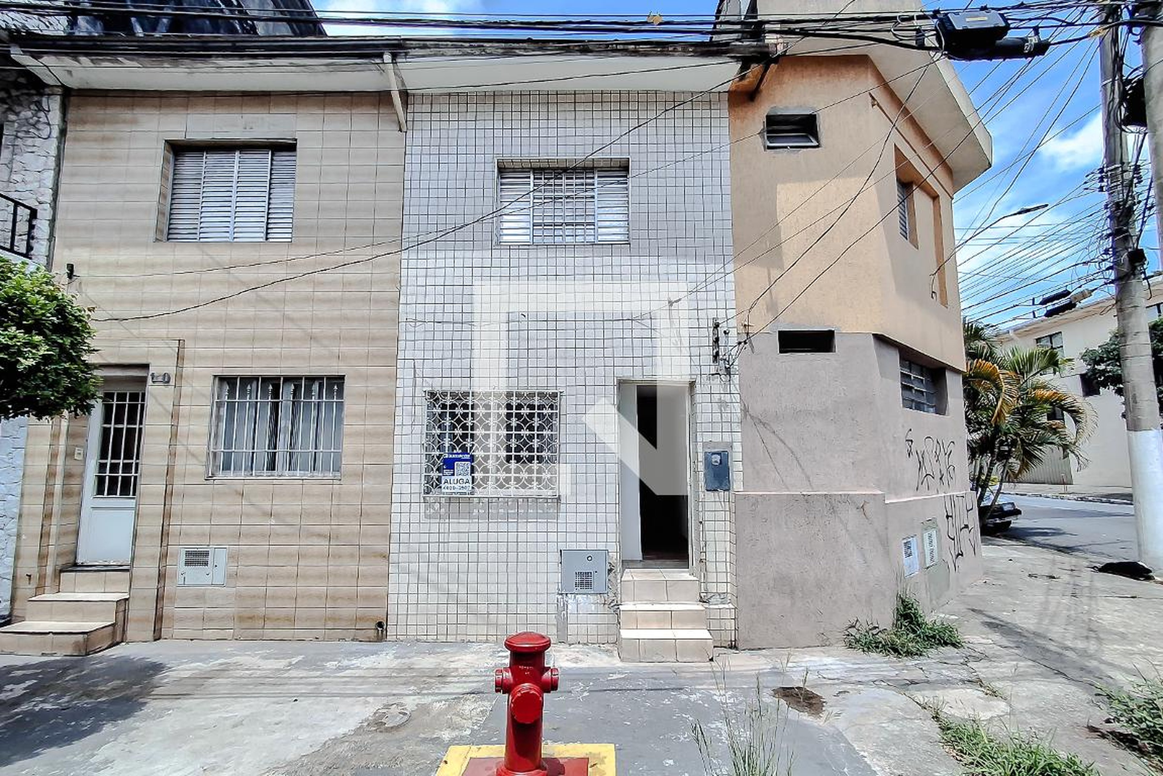 Fachada Condomínio em Rua Mil Oitocentos e Vinte e Dois, 134