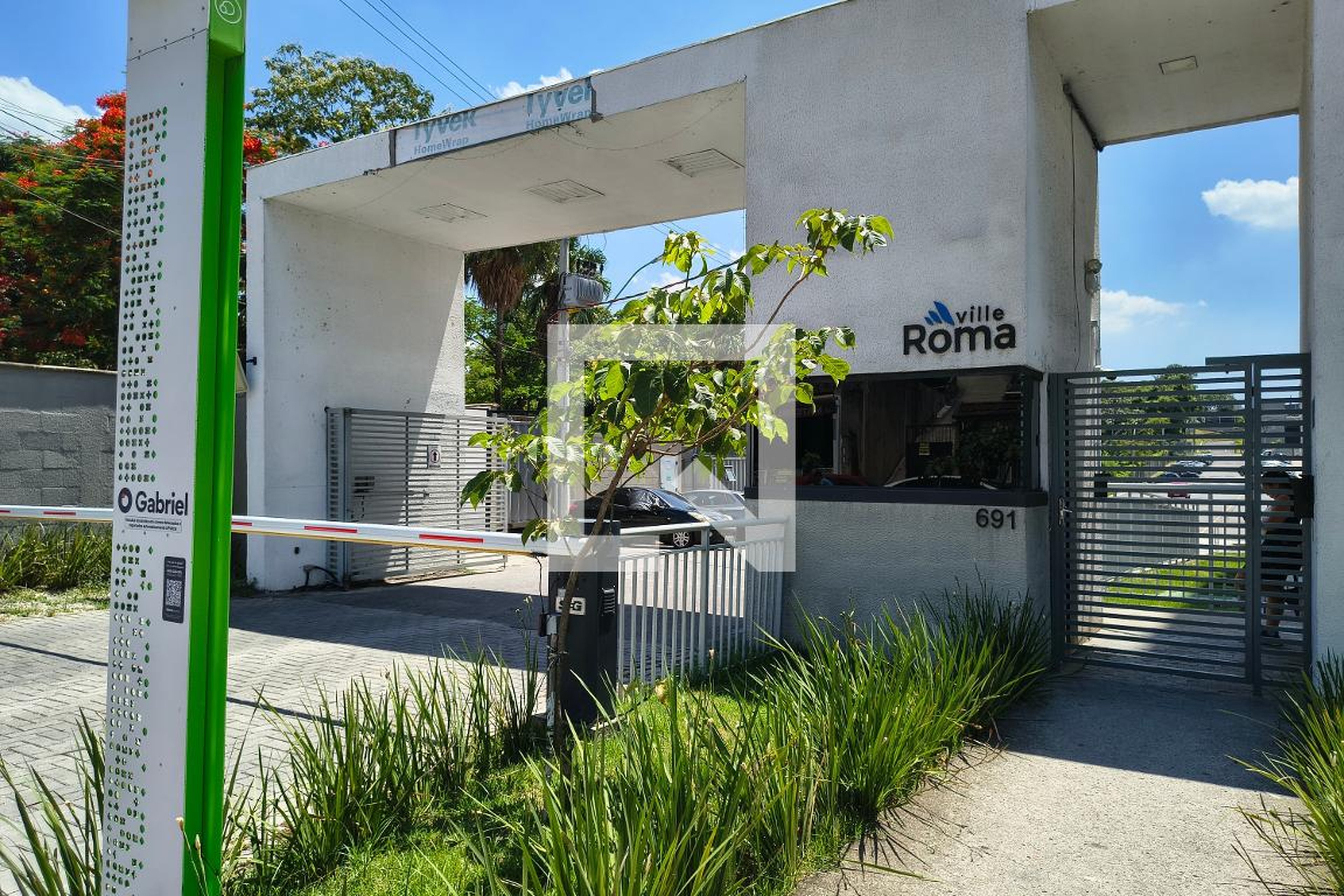 Fachada do condomínio Condomínio Ville Roma