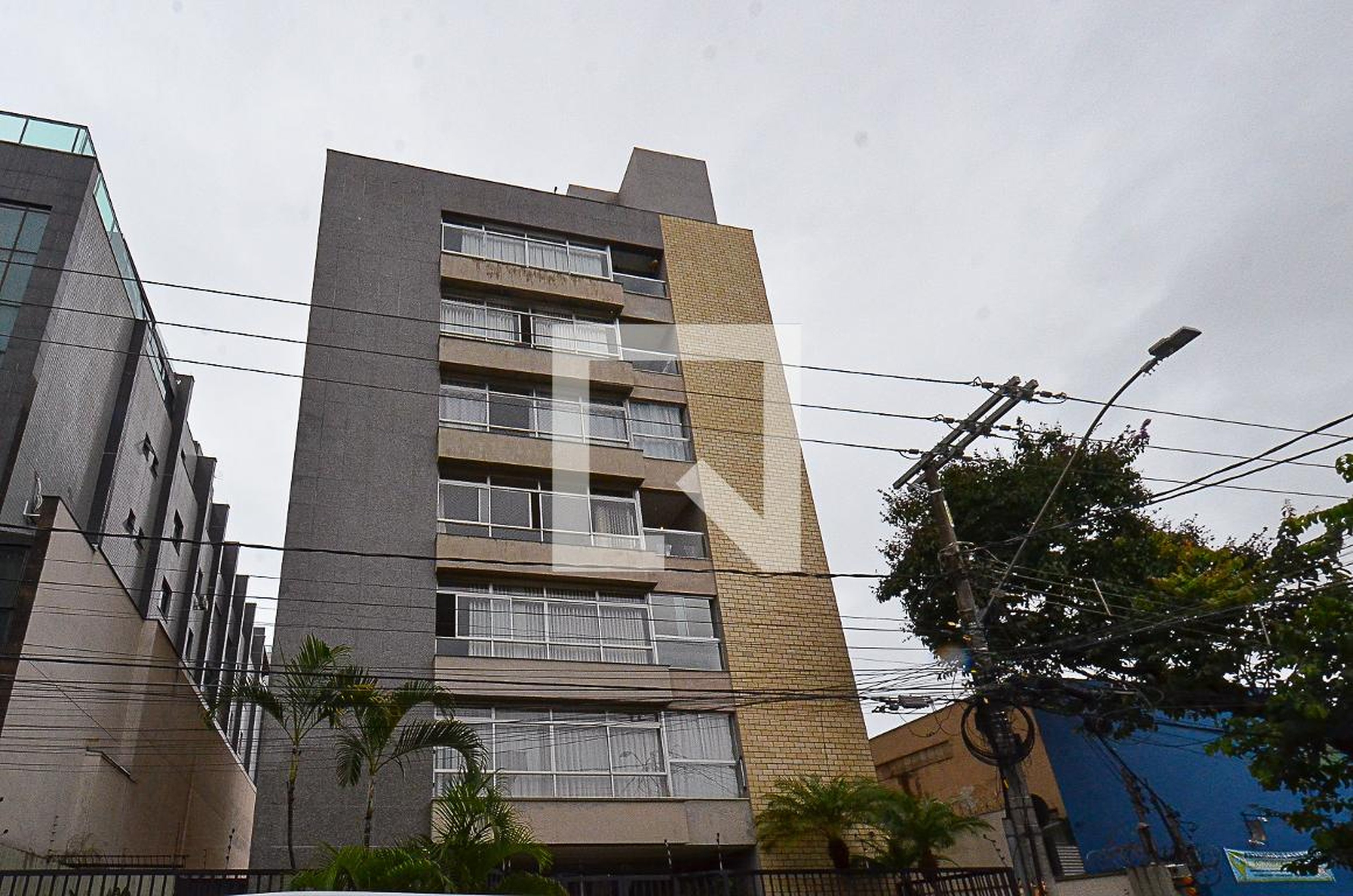 Fachada Condomínio em Rua Passa Tempo, 499