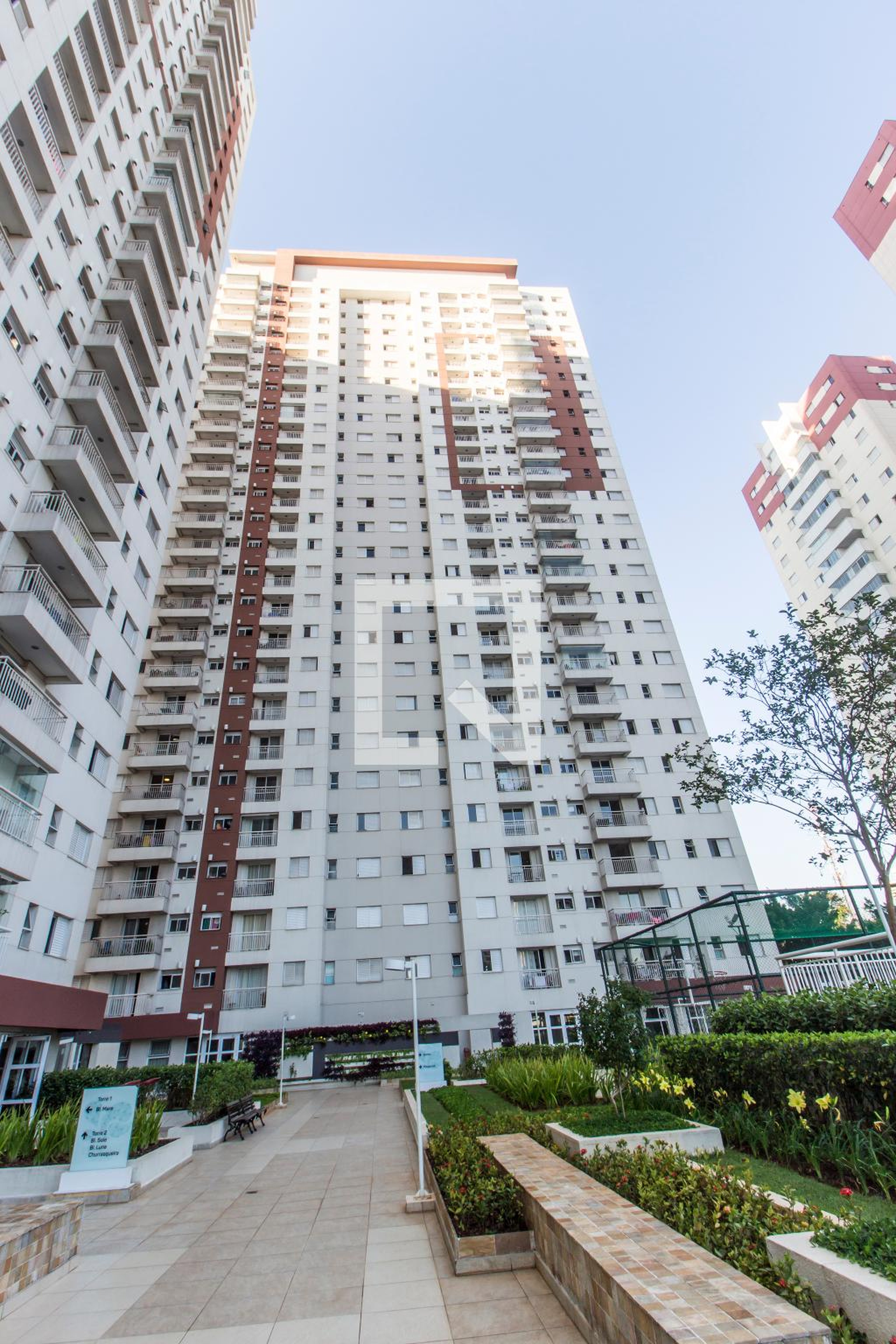 Fachada Condomínio Essencialle Home Club