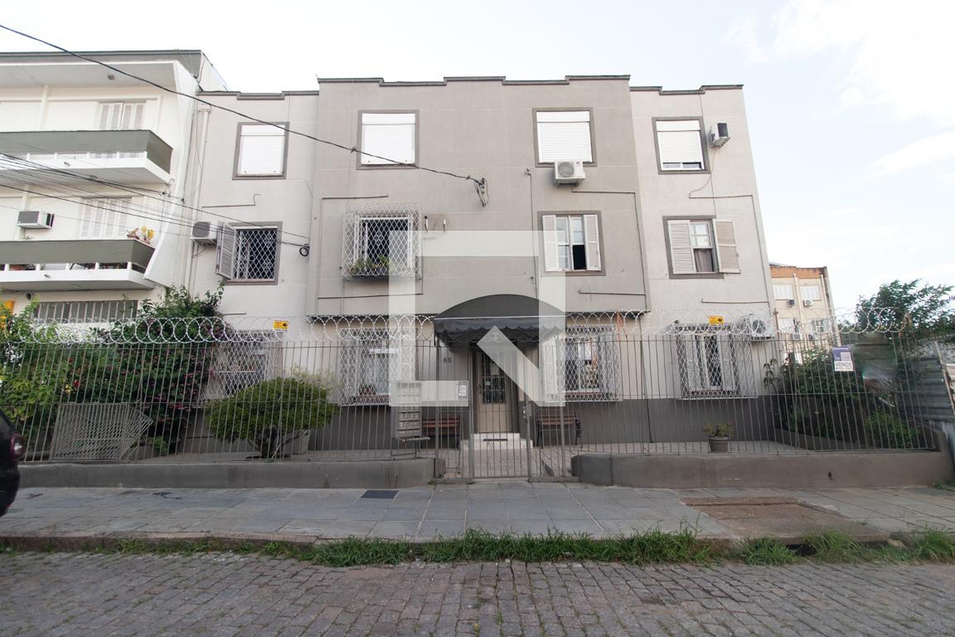 Fachada Condomínio em Rua Doutor Voltaire Pires, 65