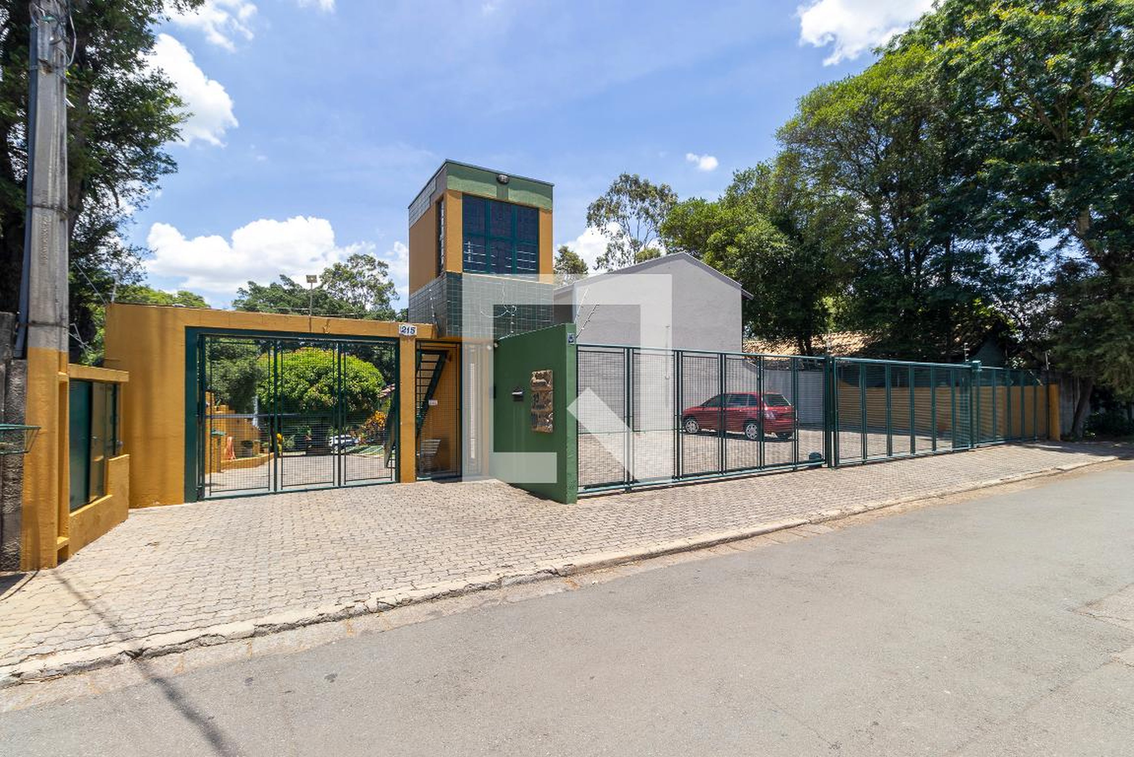 Fachada do condomínio Condomínio Parque das Mangueiras