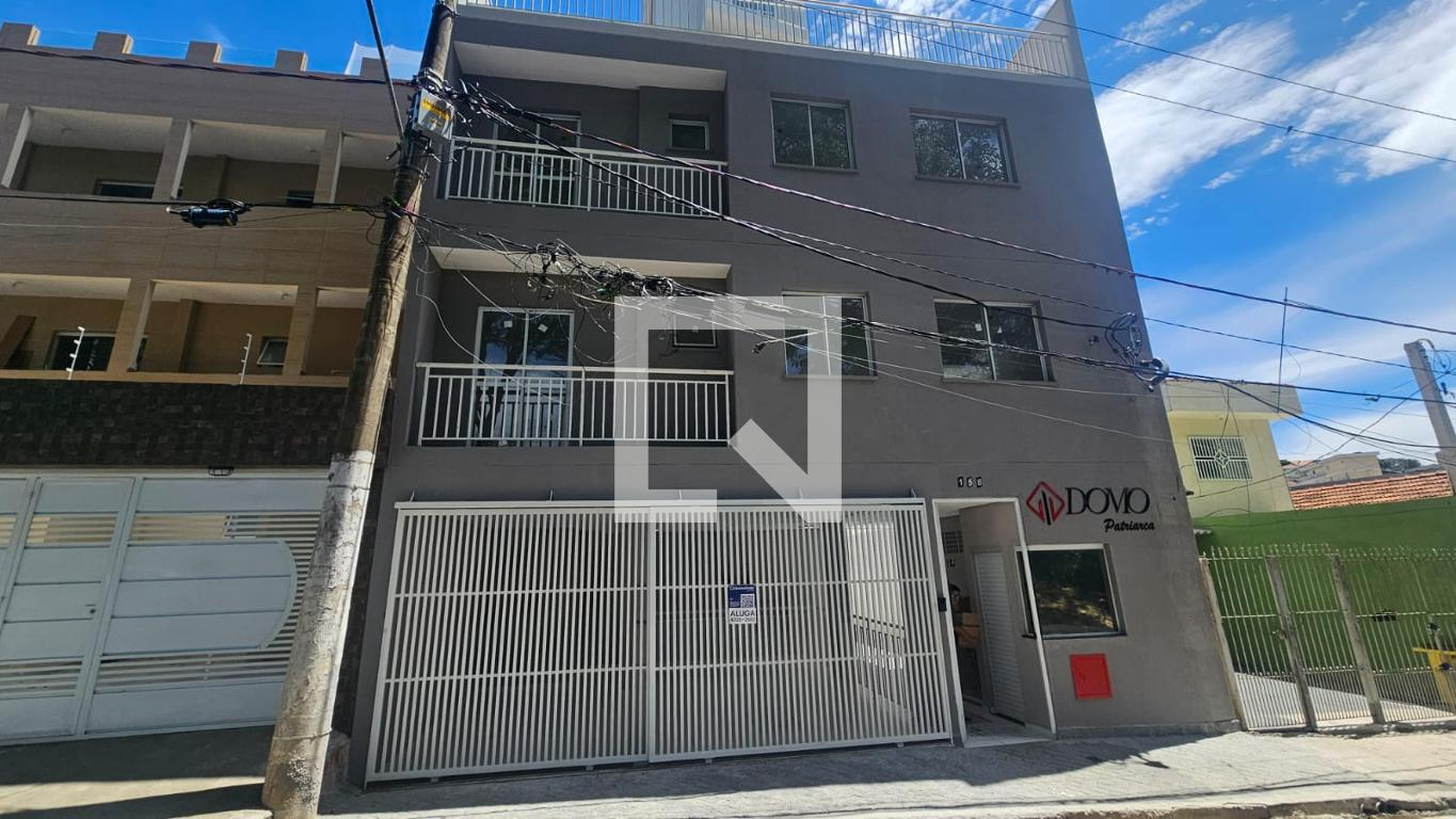 Fachada Condomínio em Rua Licânia, 158