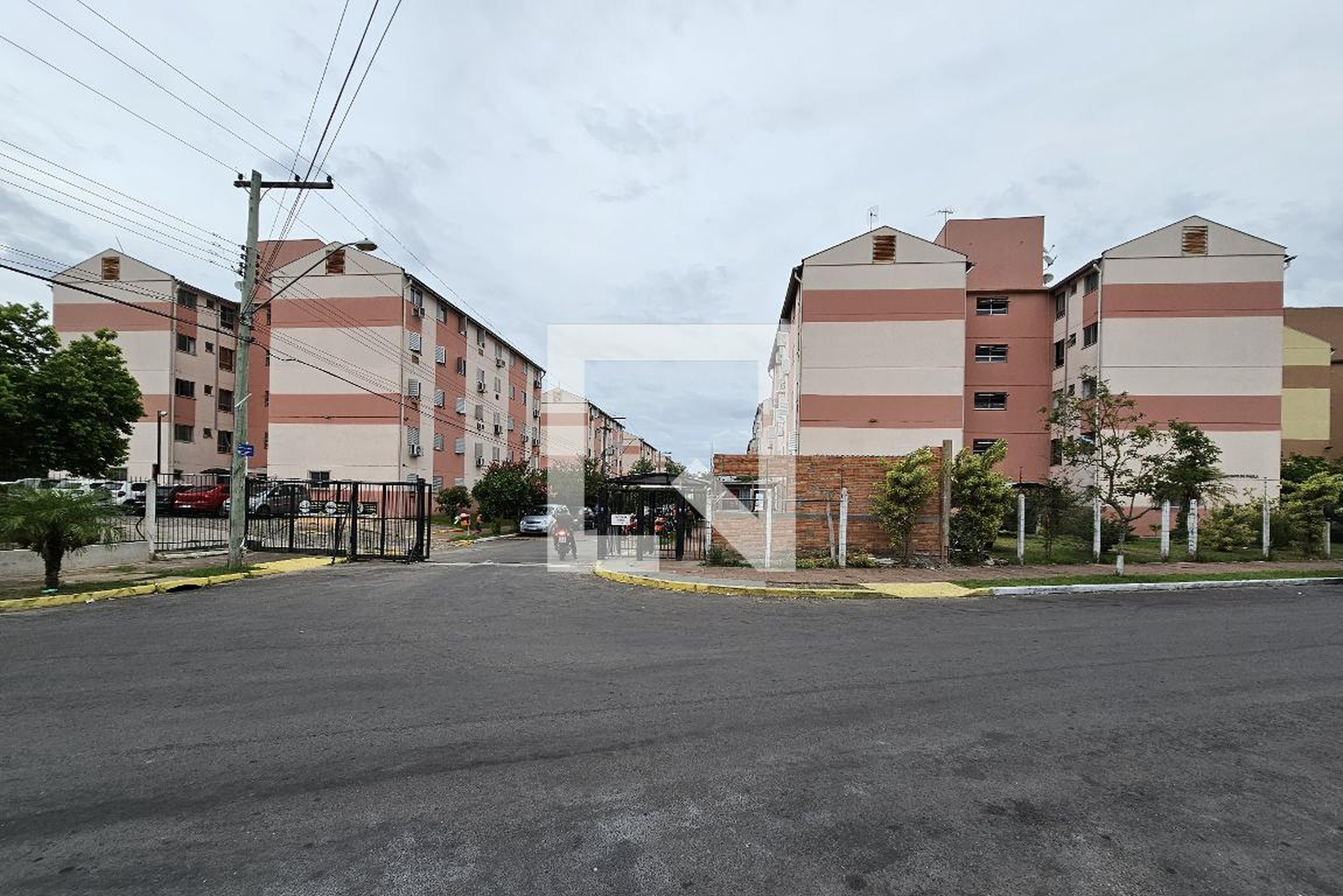 Fachada Condomínio em Rua José Barcelos Garcia, 260