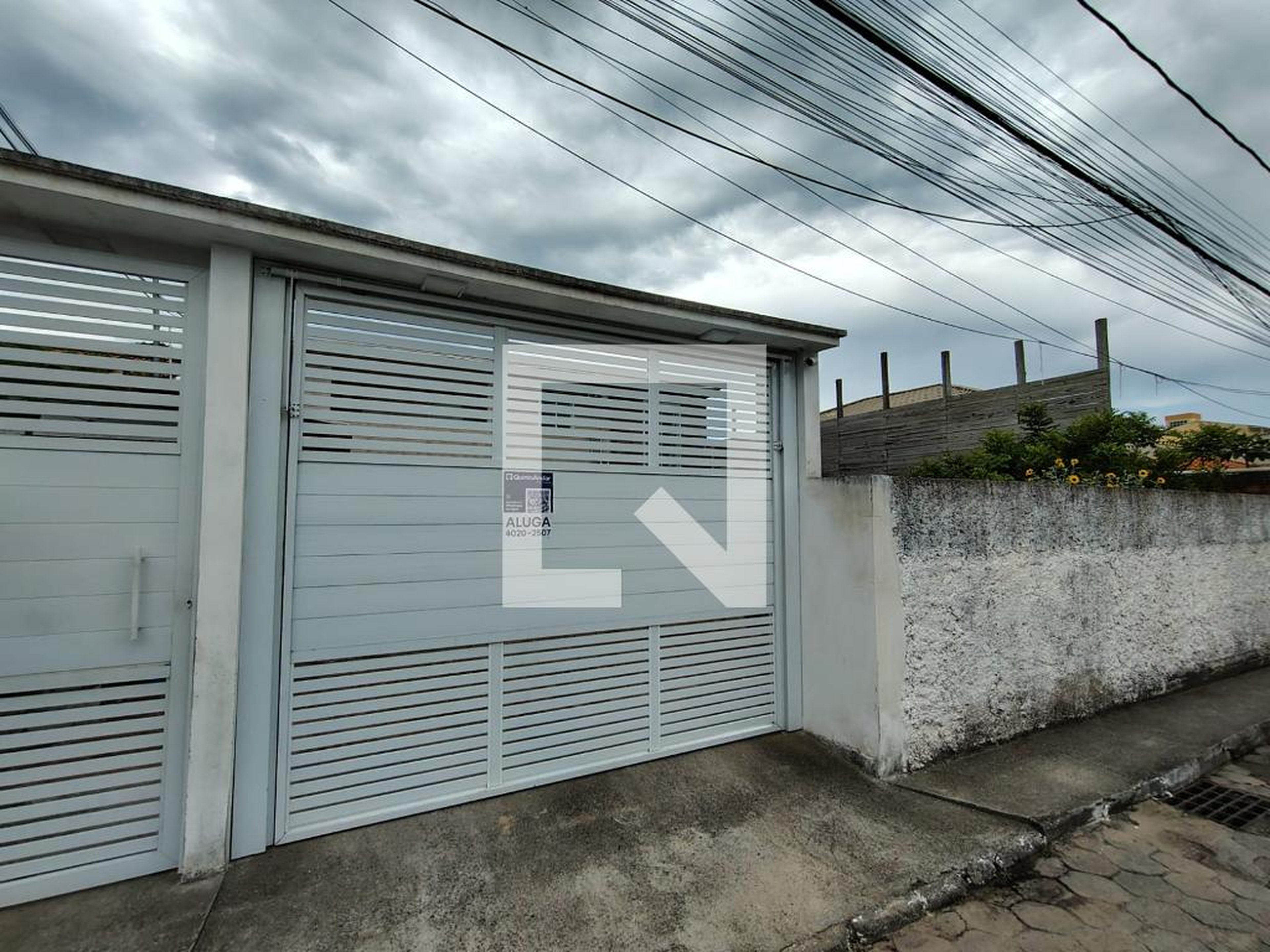 Fachada Condomínio em Travessa dos Lambaris, 157