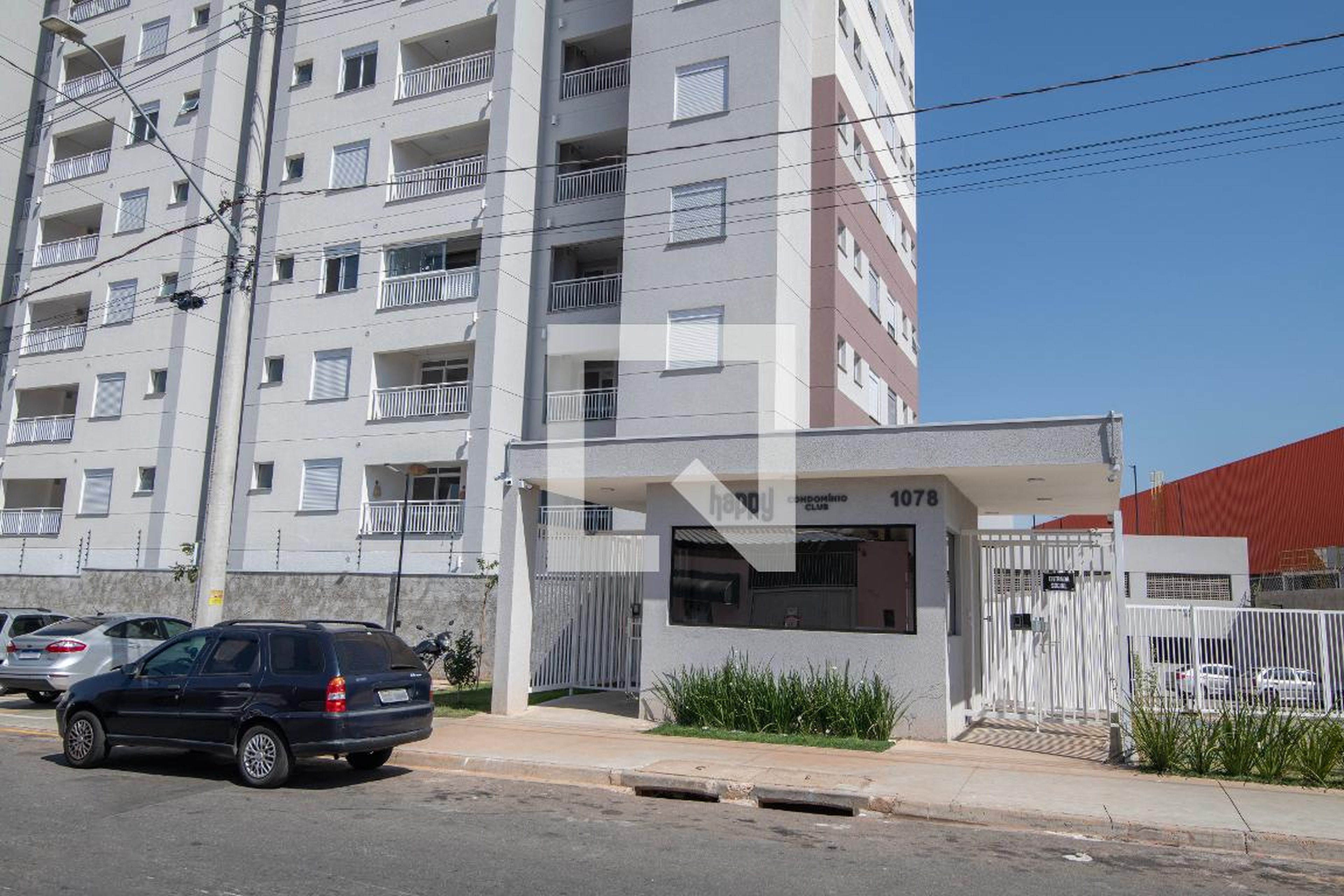 Fachada do Condomínio Condomínio Happy Club