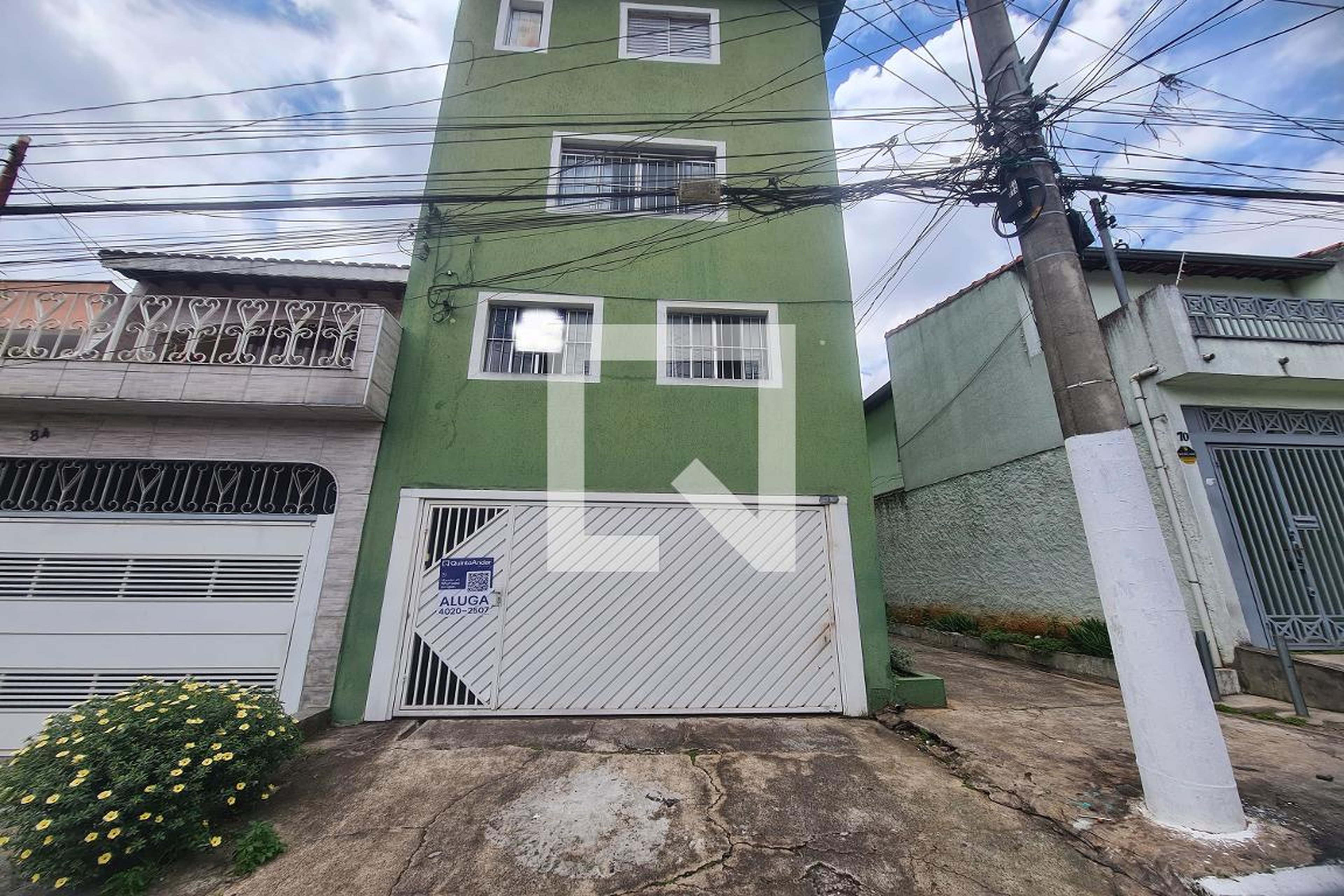 Fachada Condomínio em Rua Everton Resca, 80