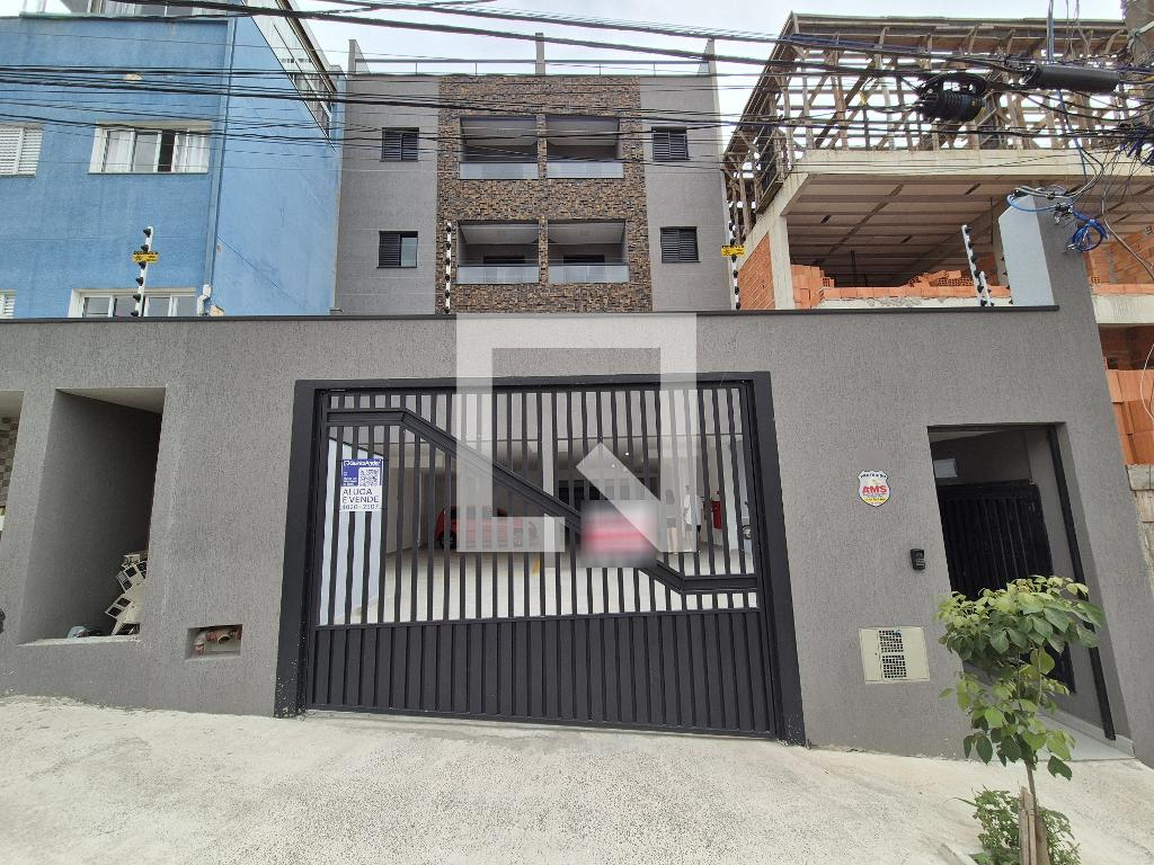 Fachada Condomínio em Rua Álvaro Lins, 36