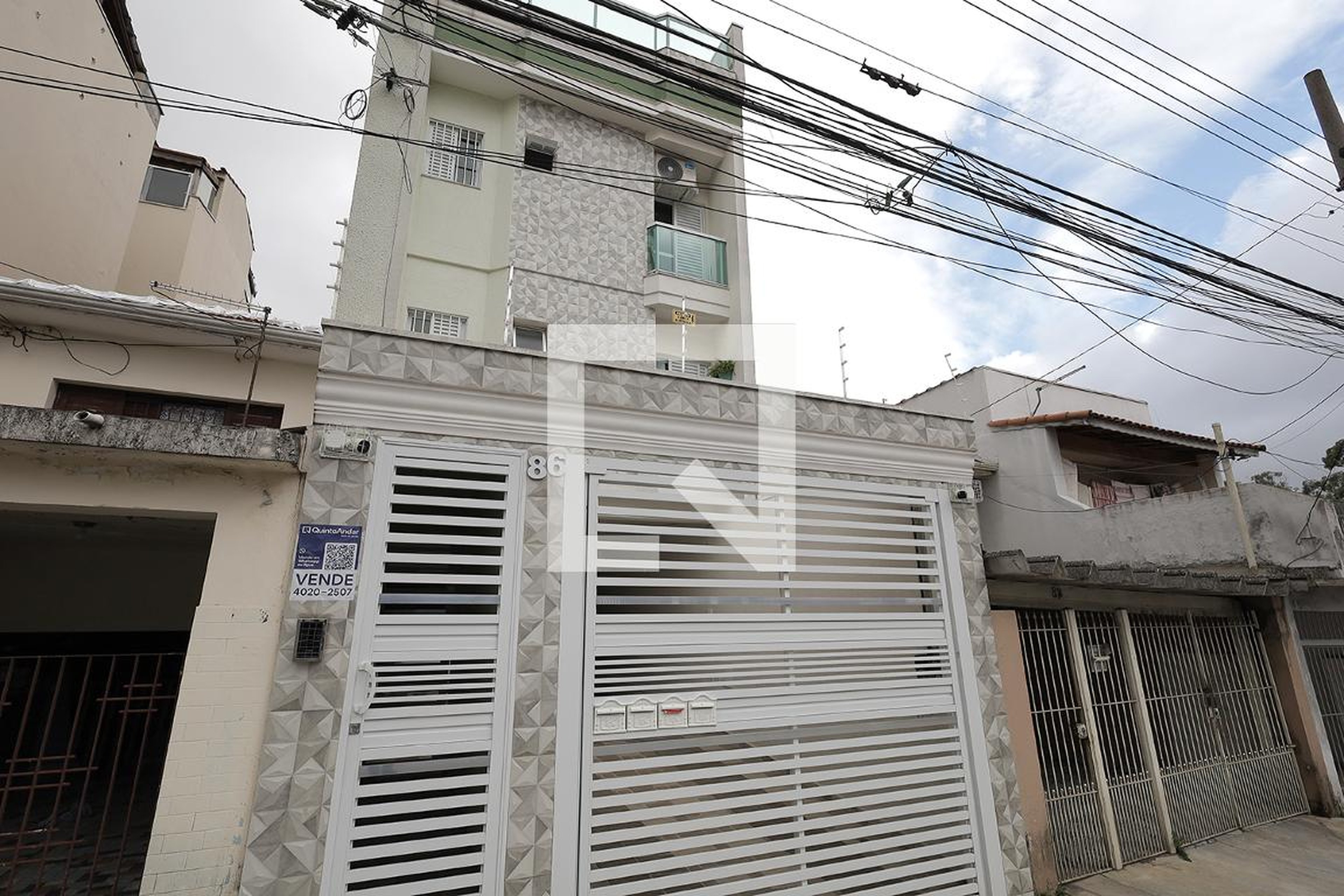 Fachada Condomínio em Rua Laureano, 86