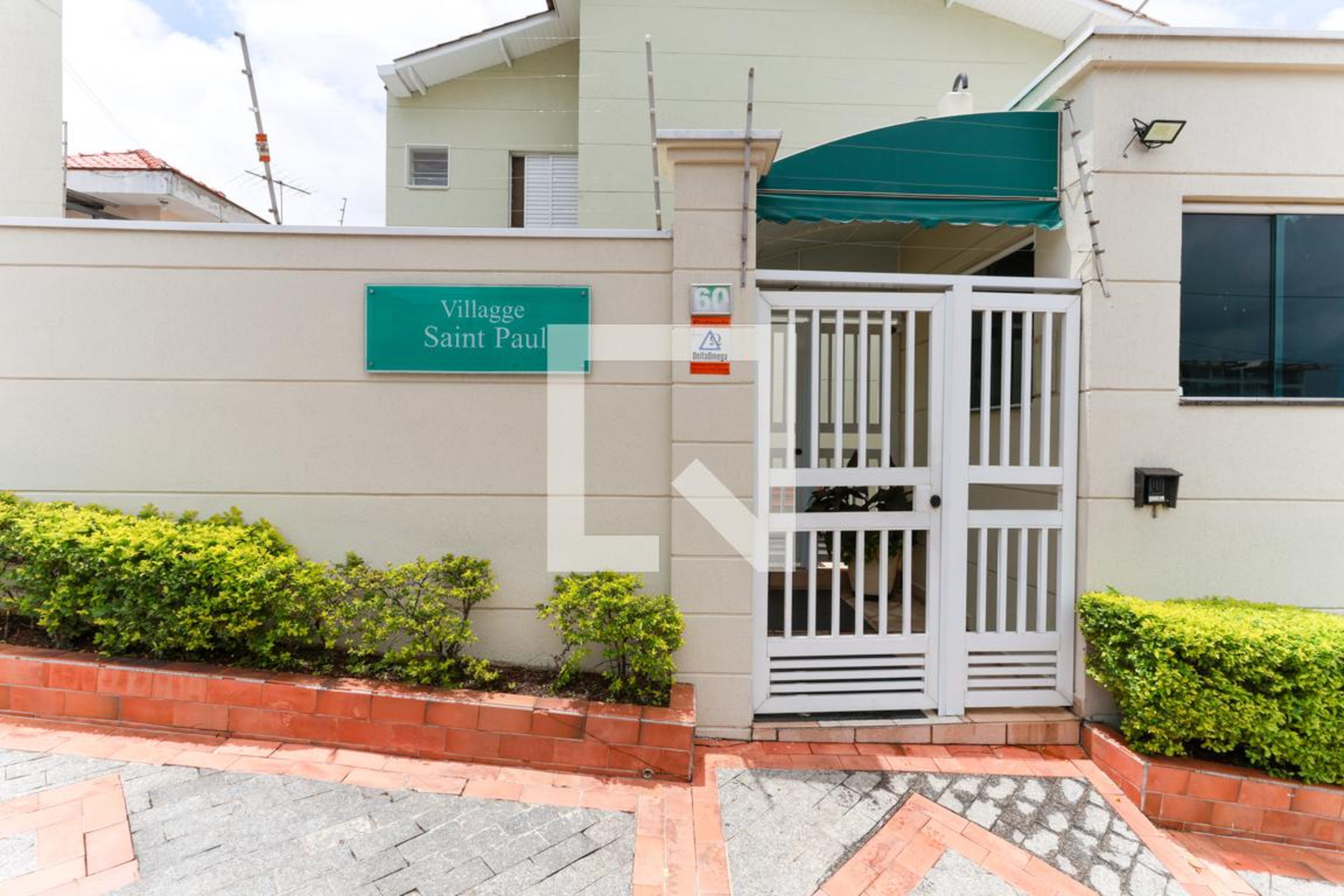 Fachada do condomínio Condomínio Conjunto Residencial Villagge Saint Paul