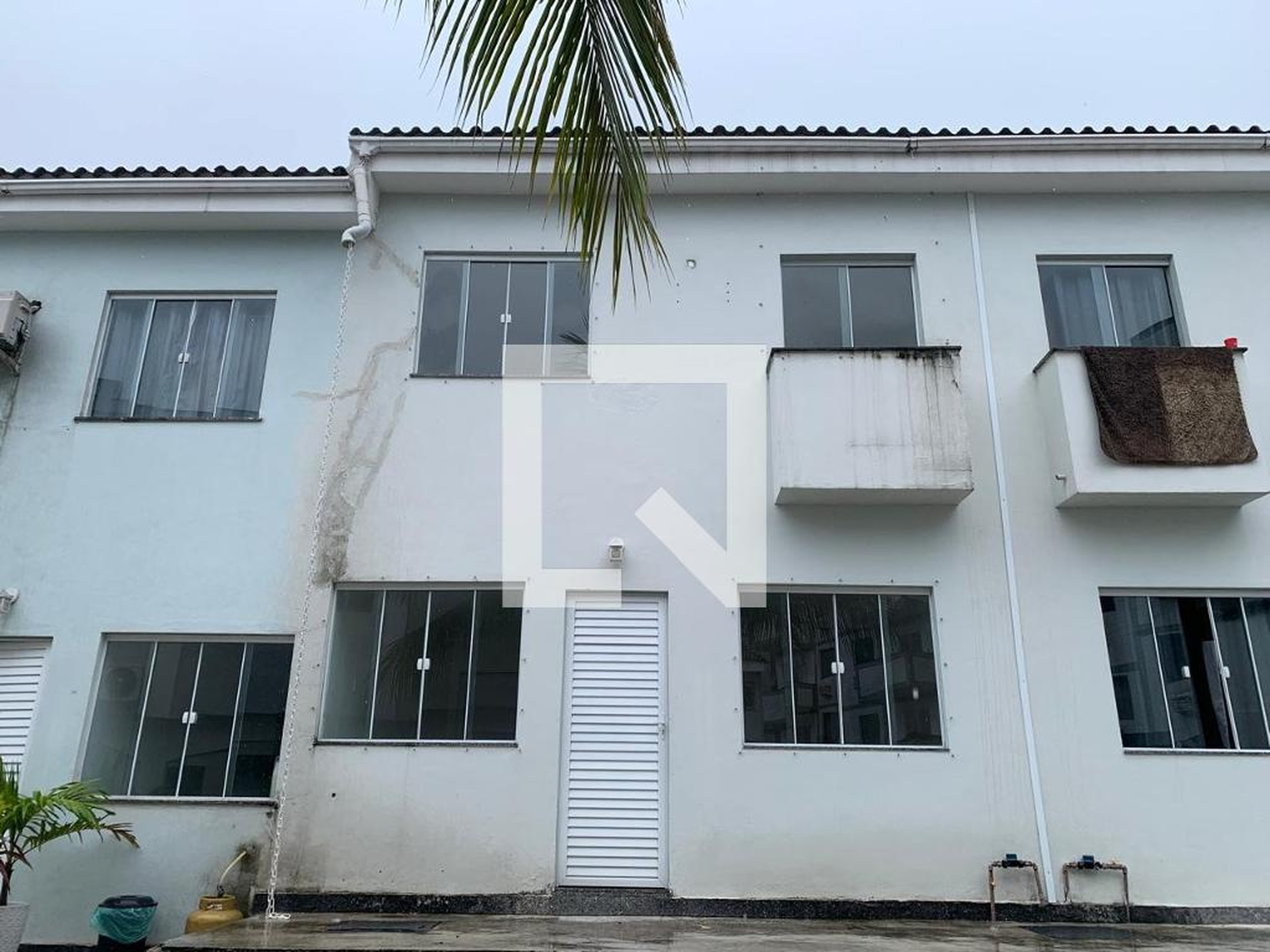 Fachada Condomínio em Rua Paturi, 555