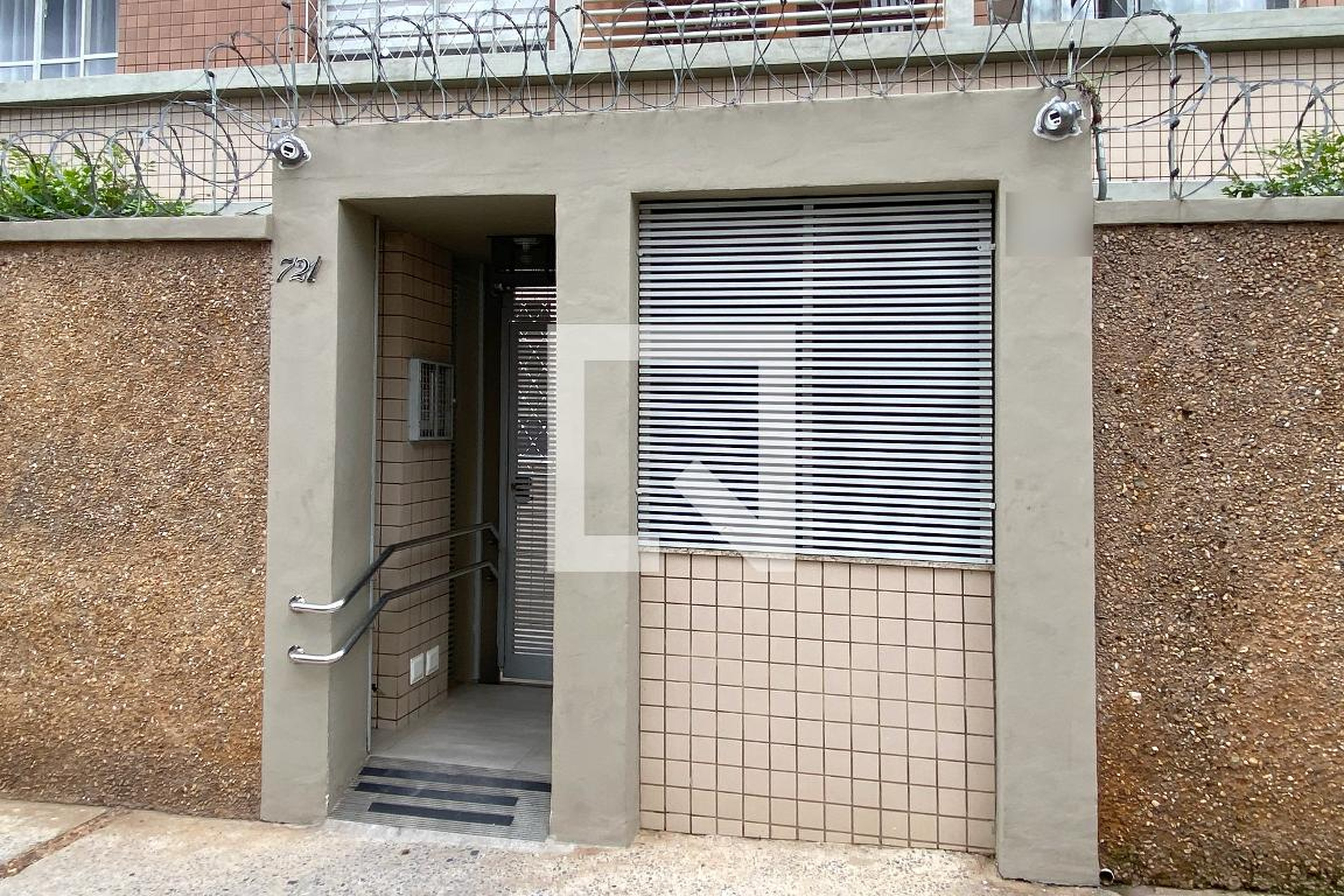 Fachada Condomínio em Rua Henrique Passini, 727