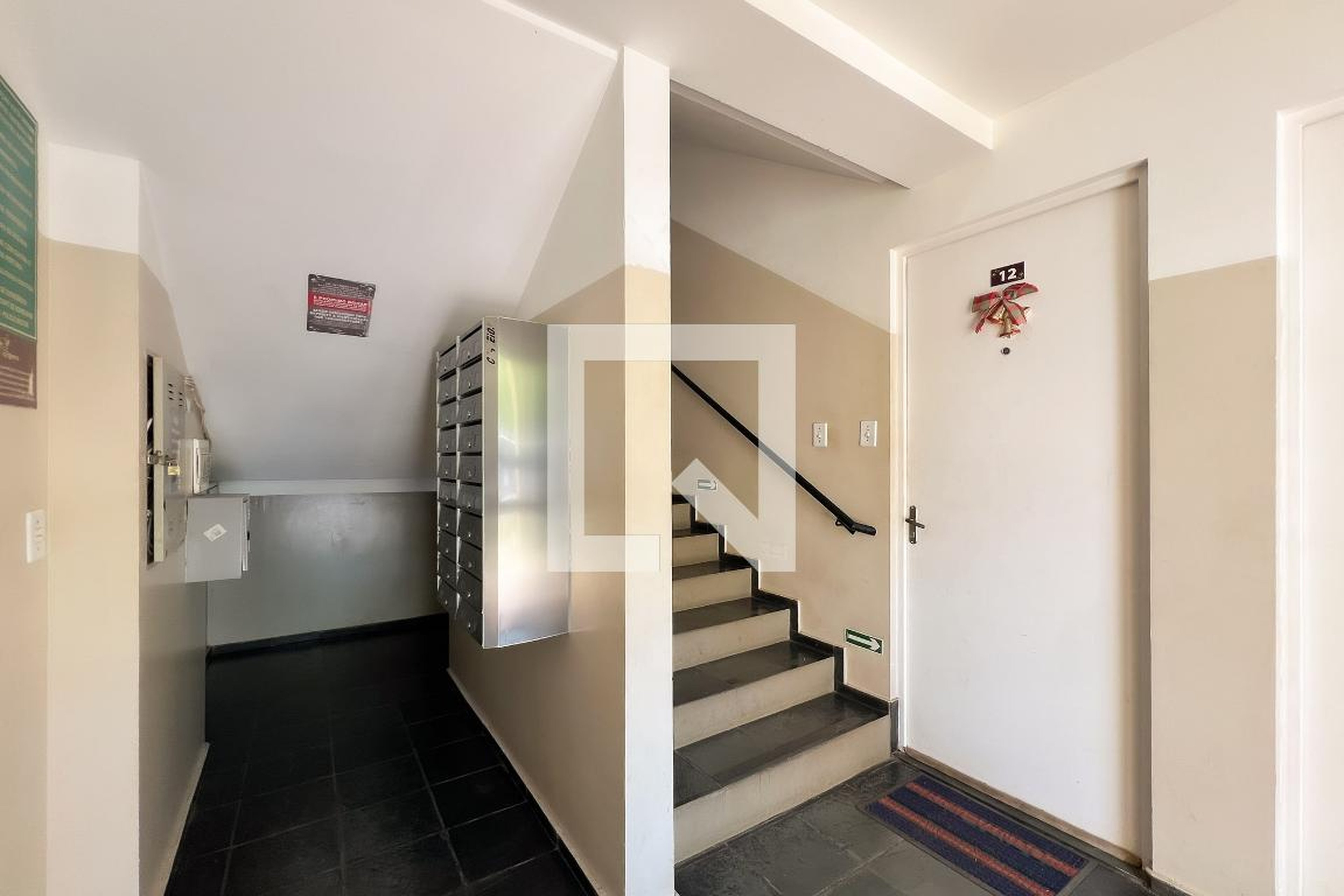 Hall de entrada Condomínio Vale das Figueiras