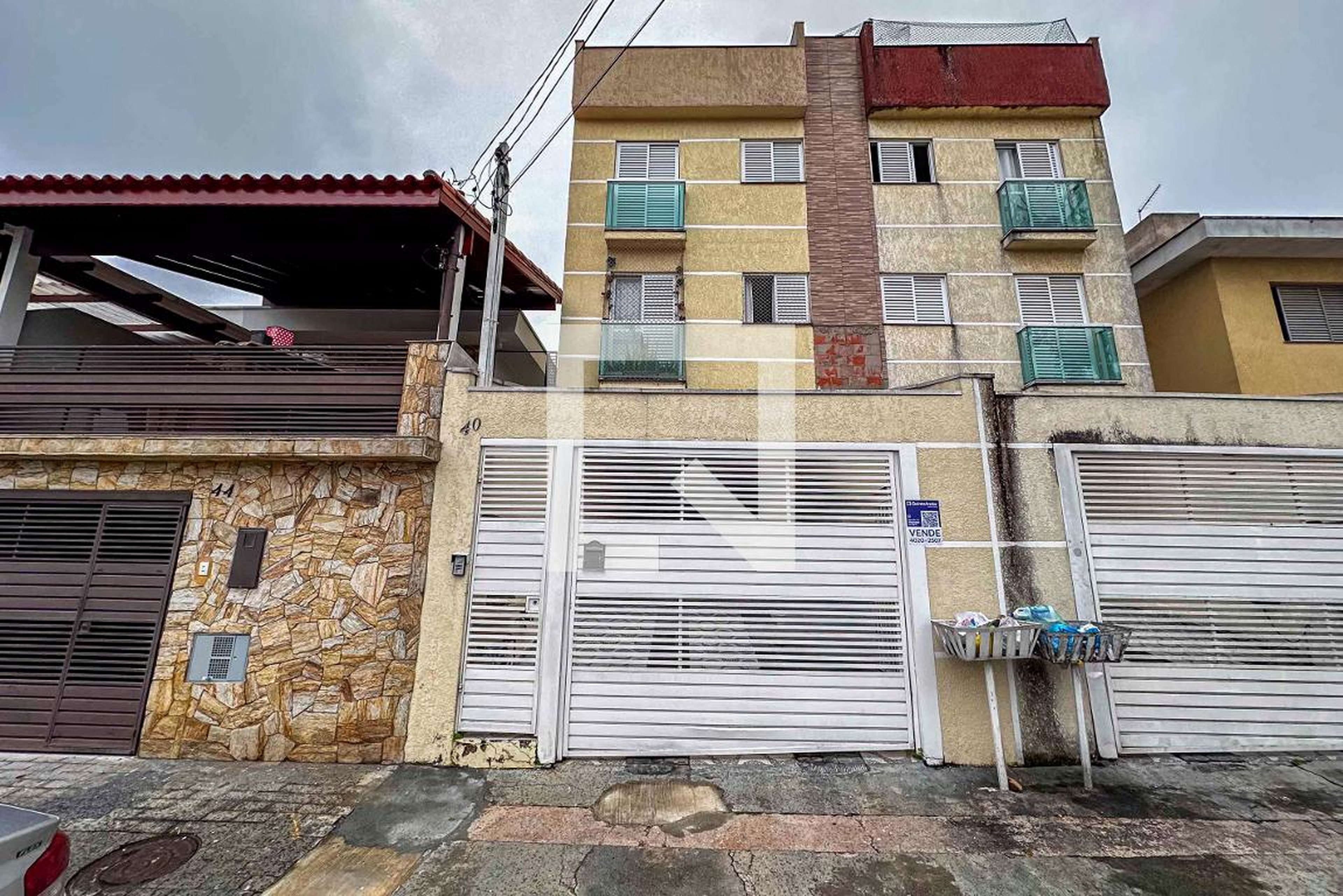 Fachada Condomínio em Rua Balsaminas, 40