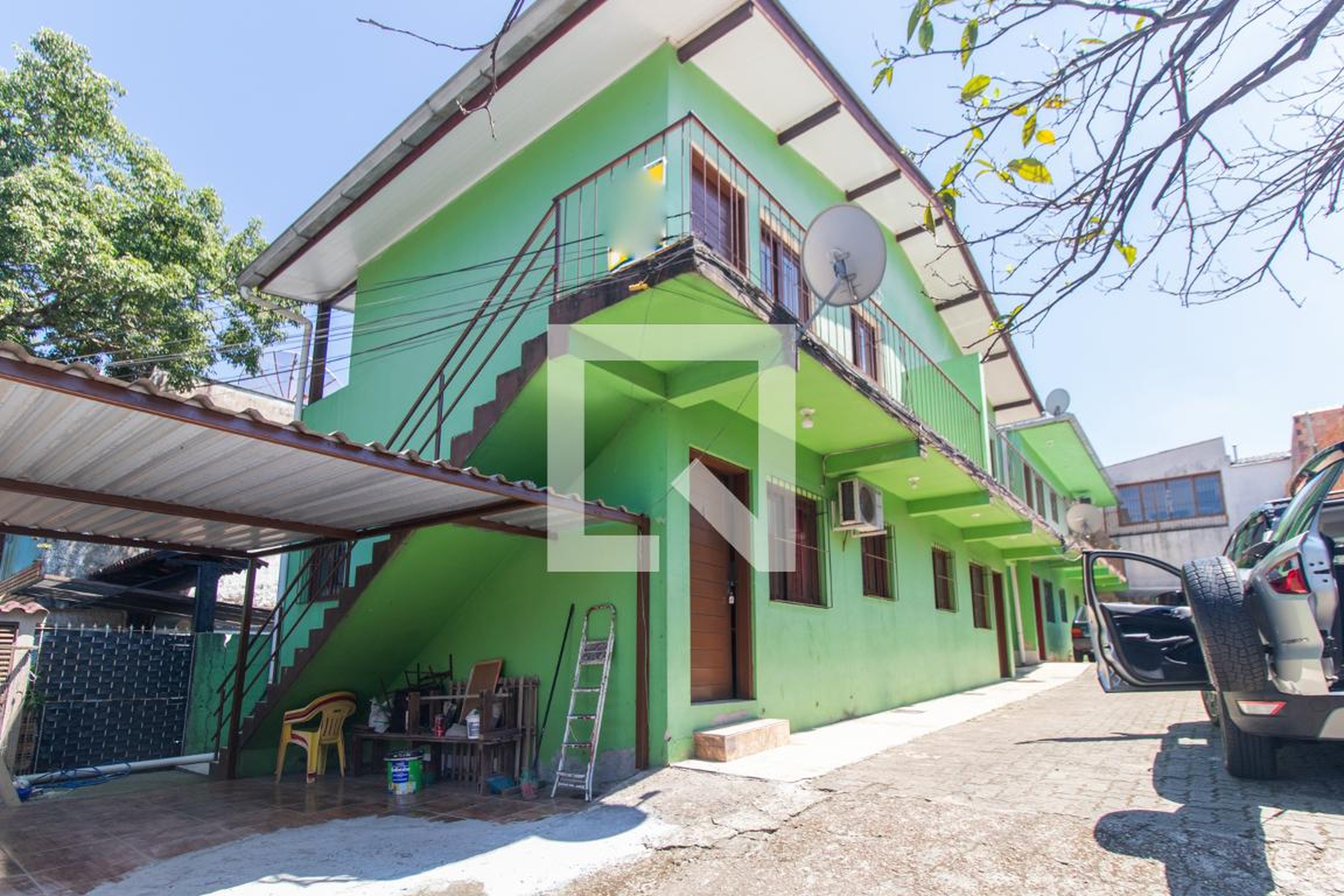 Fachada Condomínio em Estrada João Passuelo, 1420