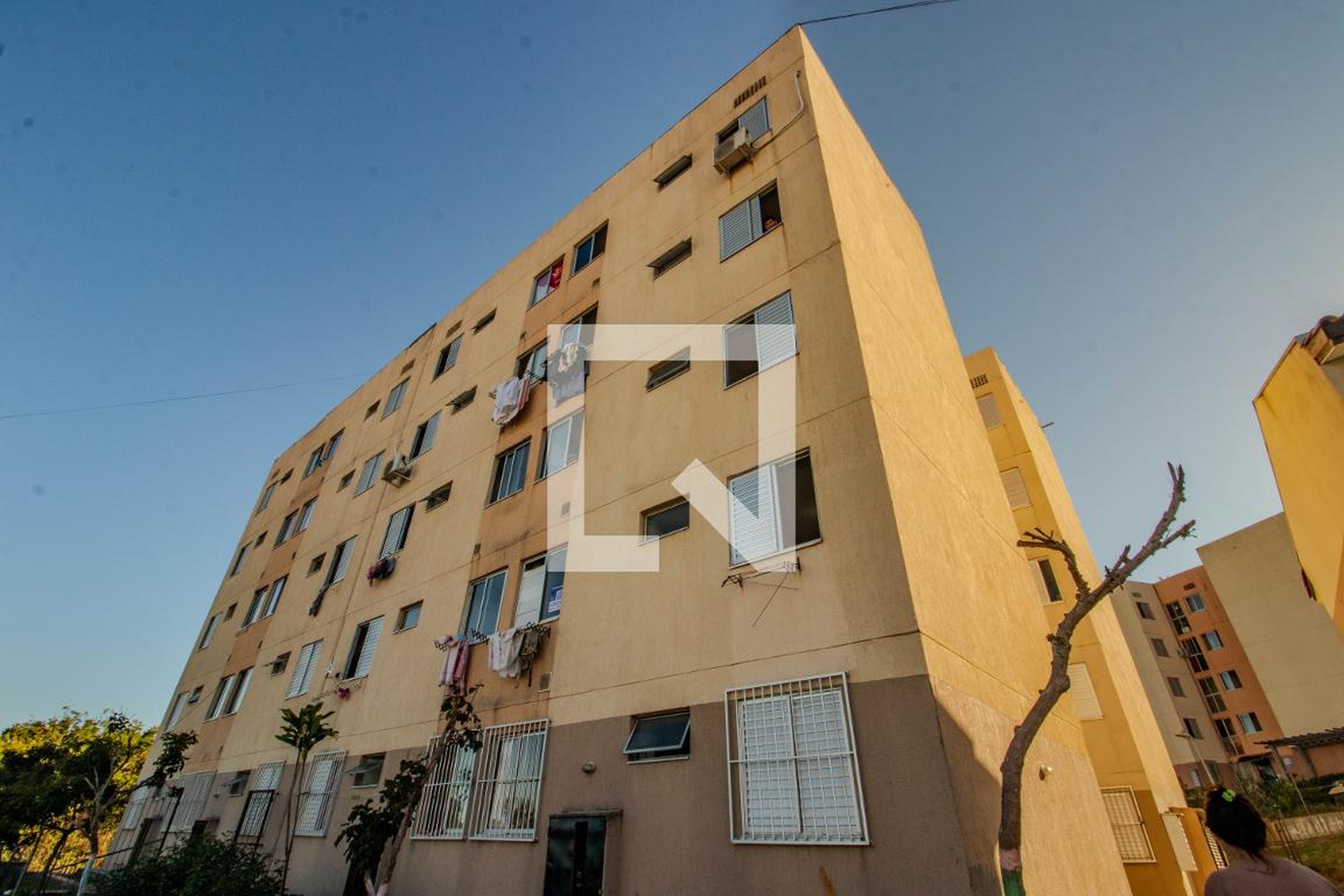 Fachada Condomínio em Rua Irmão Antônio Cecchin, 214