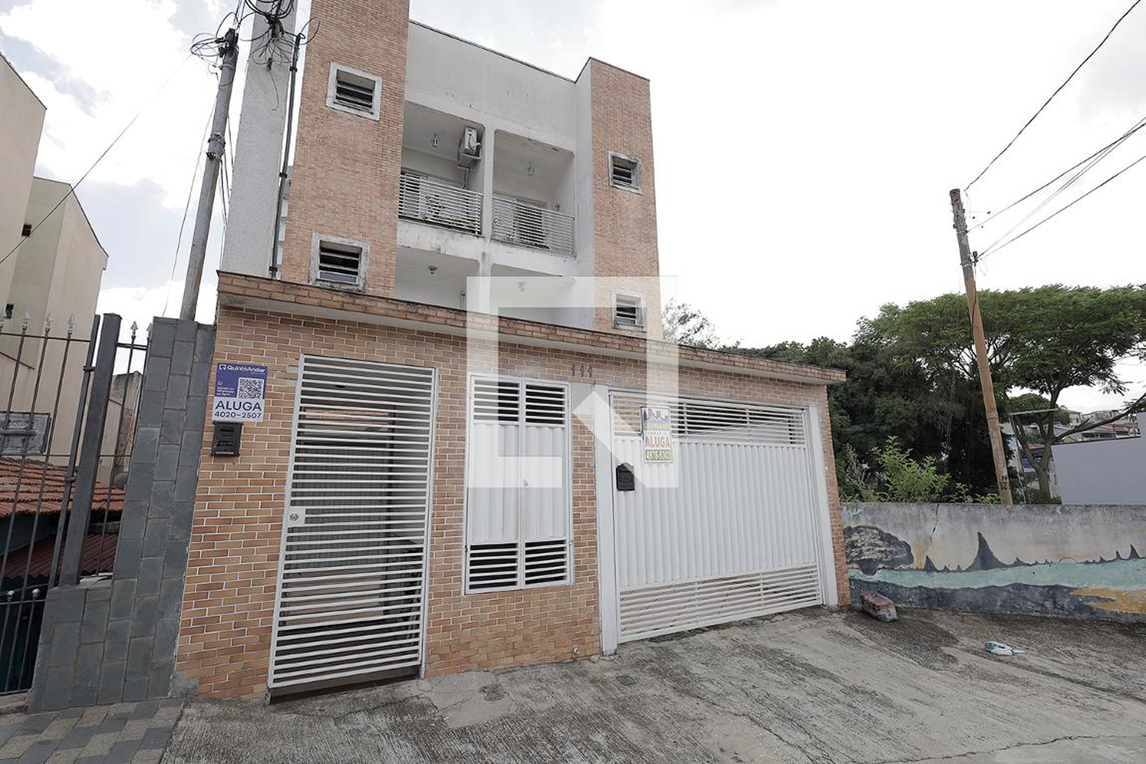 Fachada Condomínio em Rua Comodoro, 111