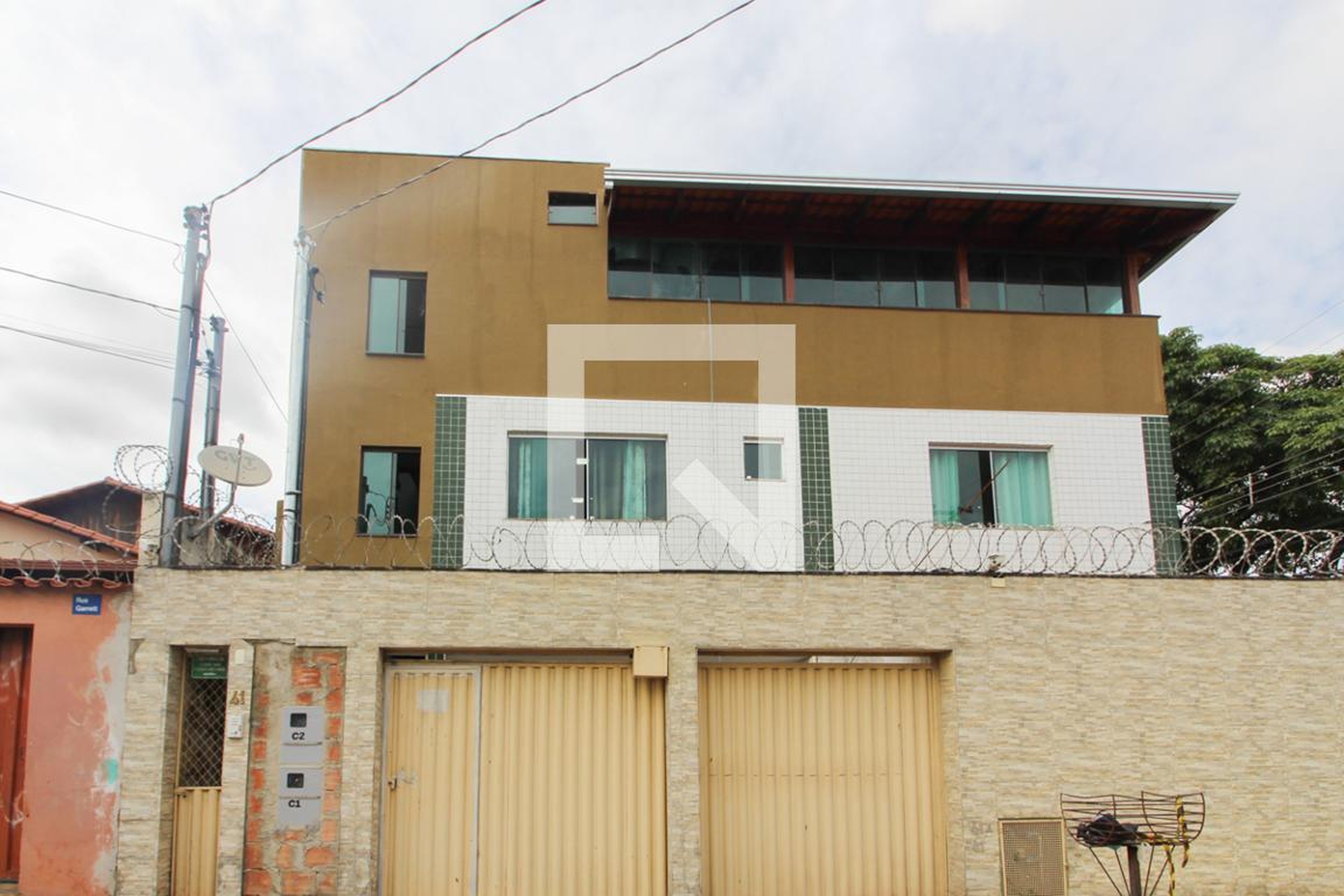 Fachada Condomínio em Rua Garrete, 41