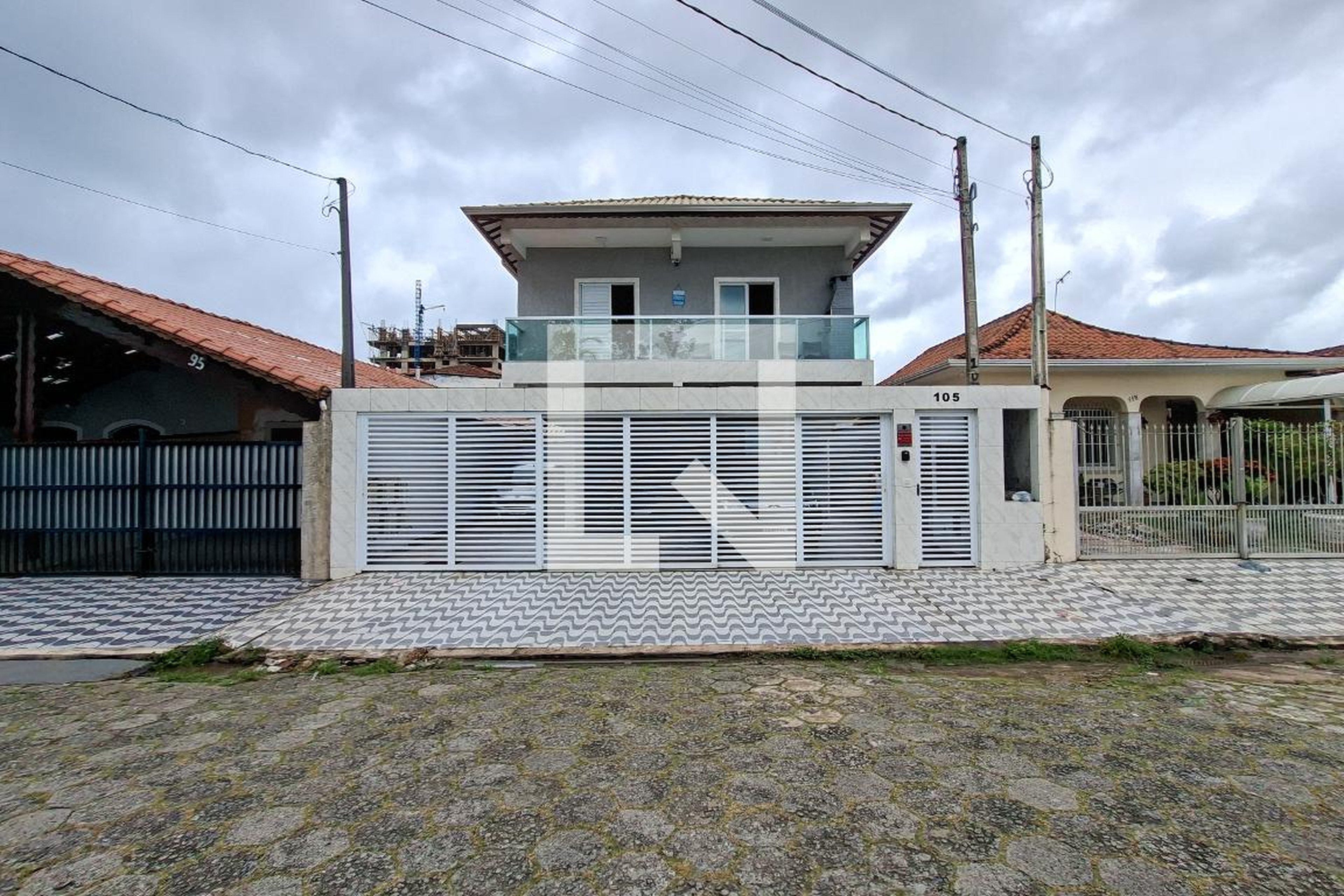 Fachada Condomínio em Rua Lilás, 105