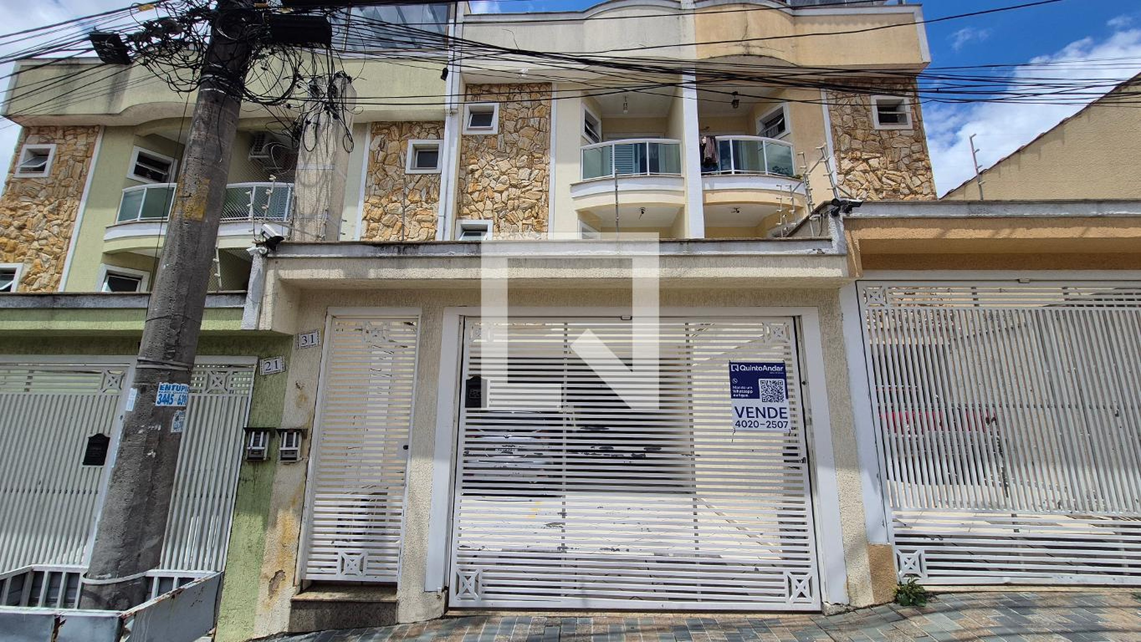 Fachada Condomínio em Rua Ercília, 31