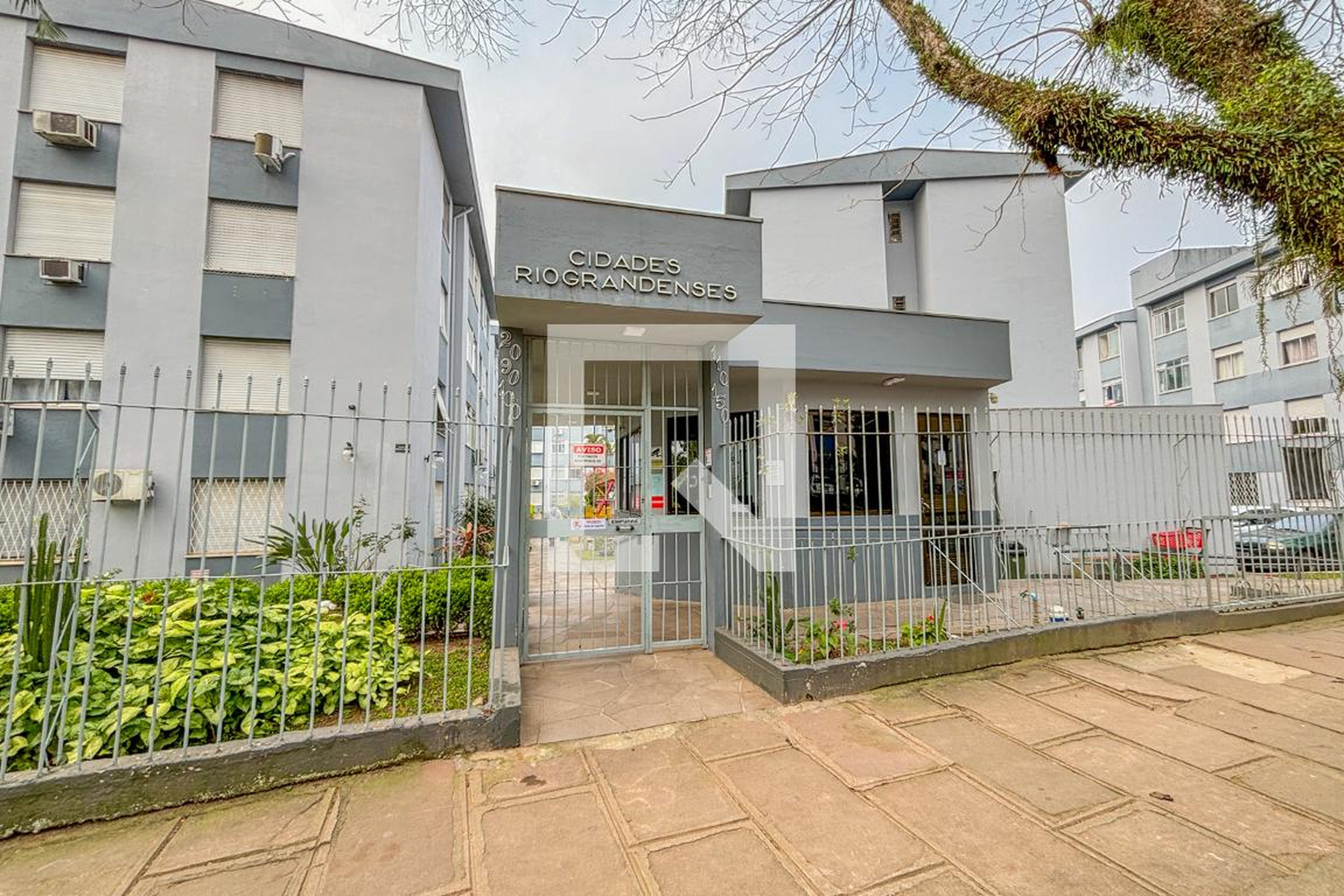 Fachada Condomínio em Rua Diomário Moojen, 100