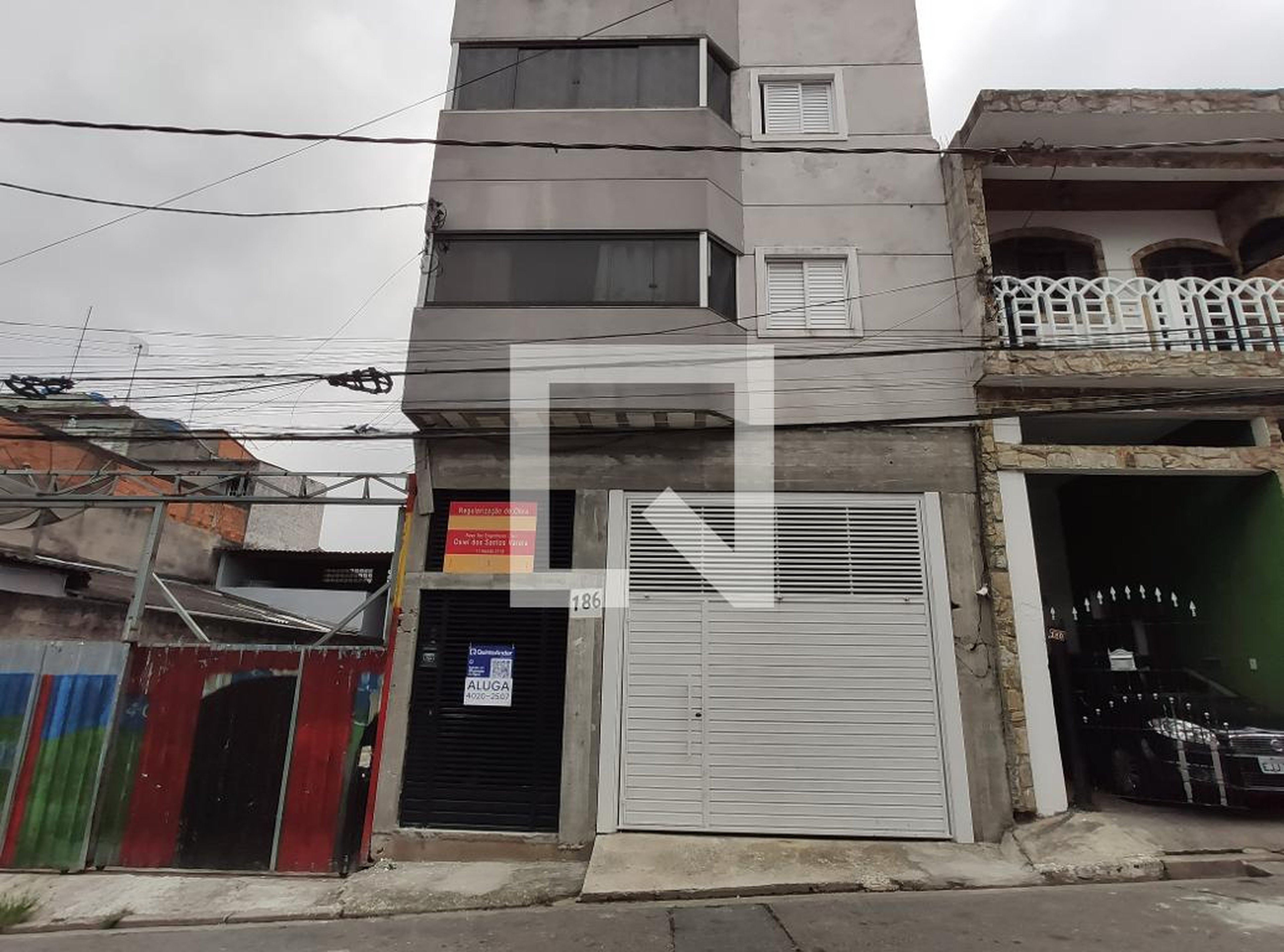 Fachada Condomínio em Rua Artur Bernardes, 186