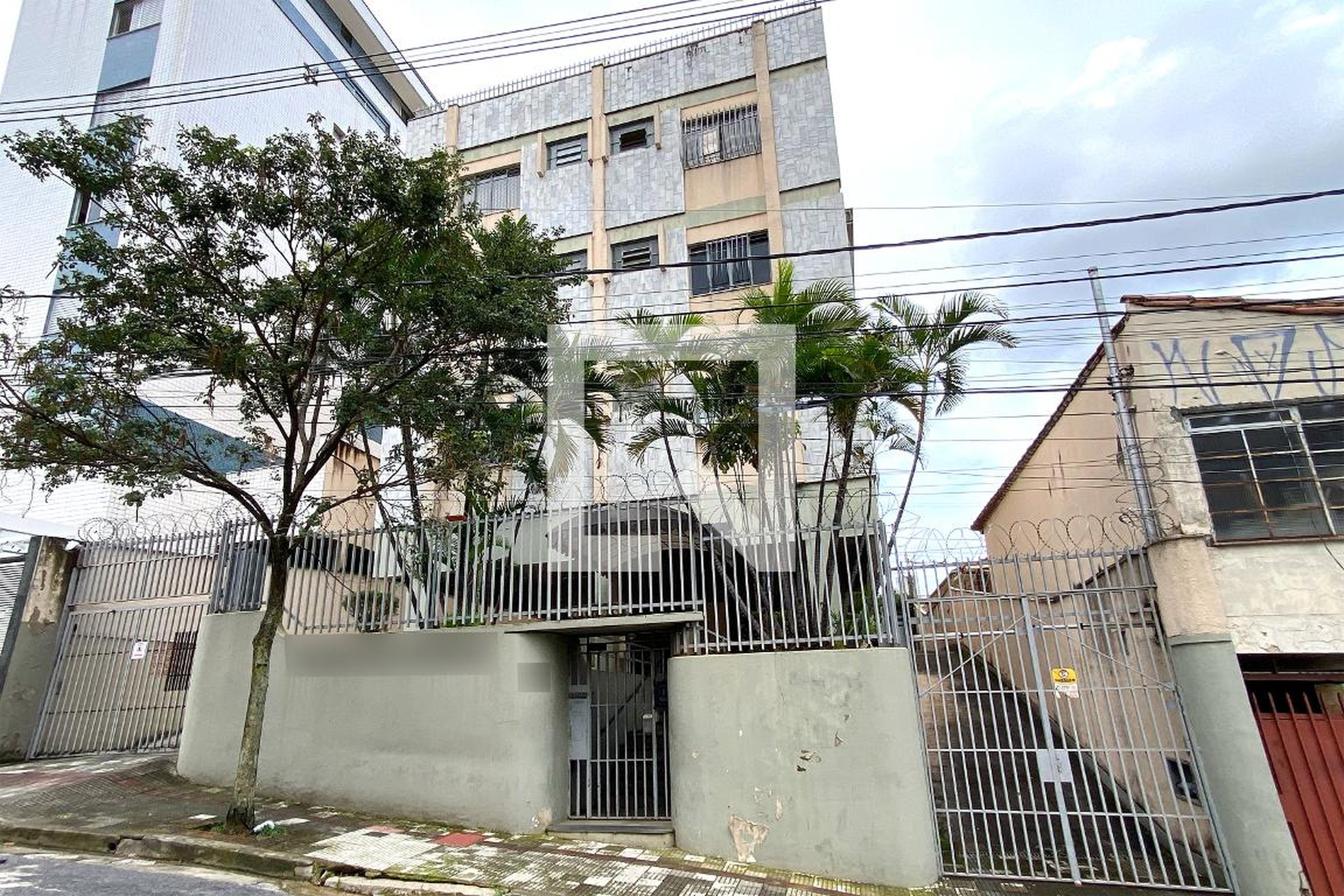 Fachada Condomínio em Rua Dona Nancy de Vasconcelos Gomes, 196
