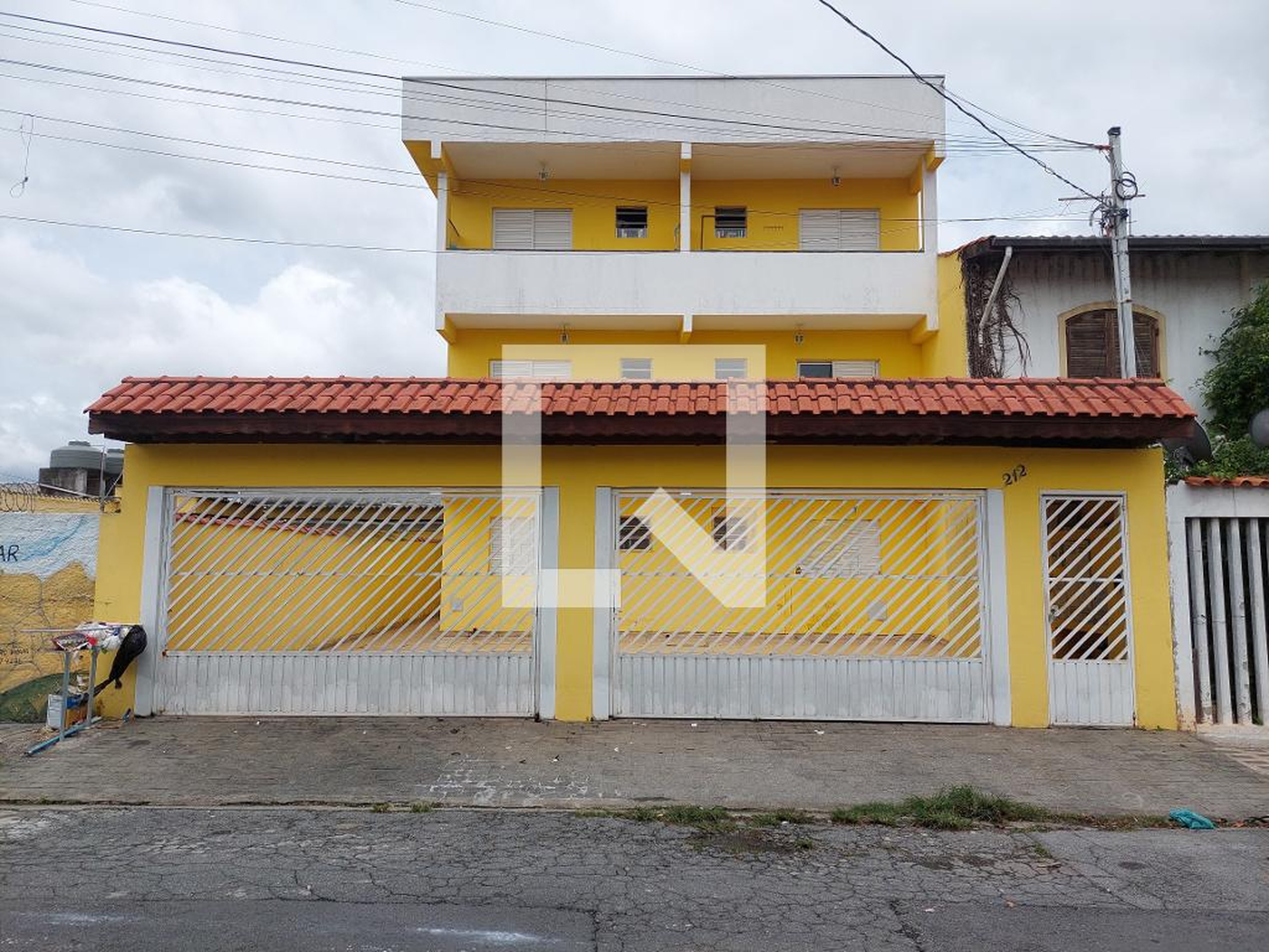 Fachada Condomínio em Rua Silvestre de Faria Lobo, 212