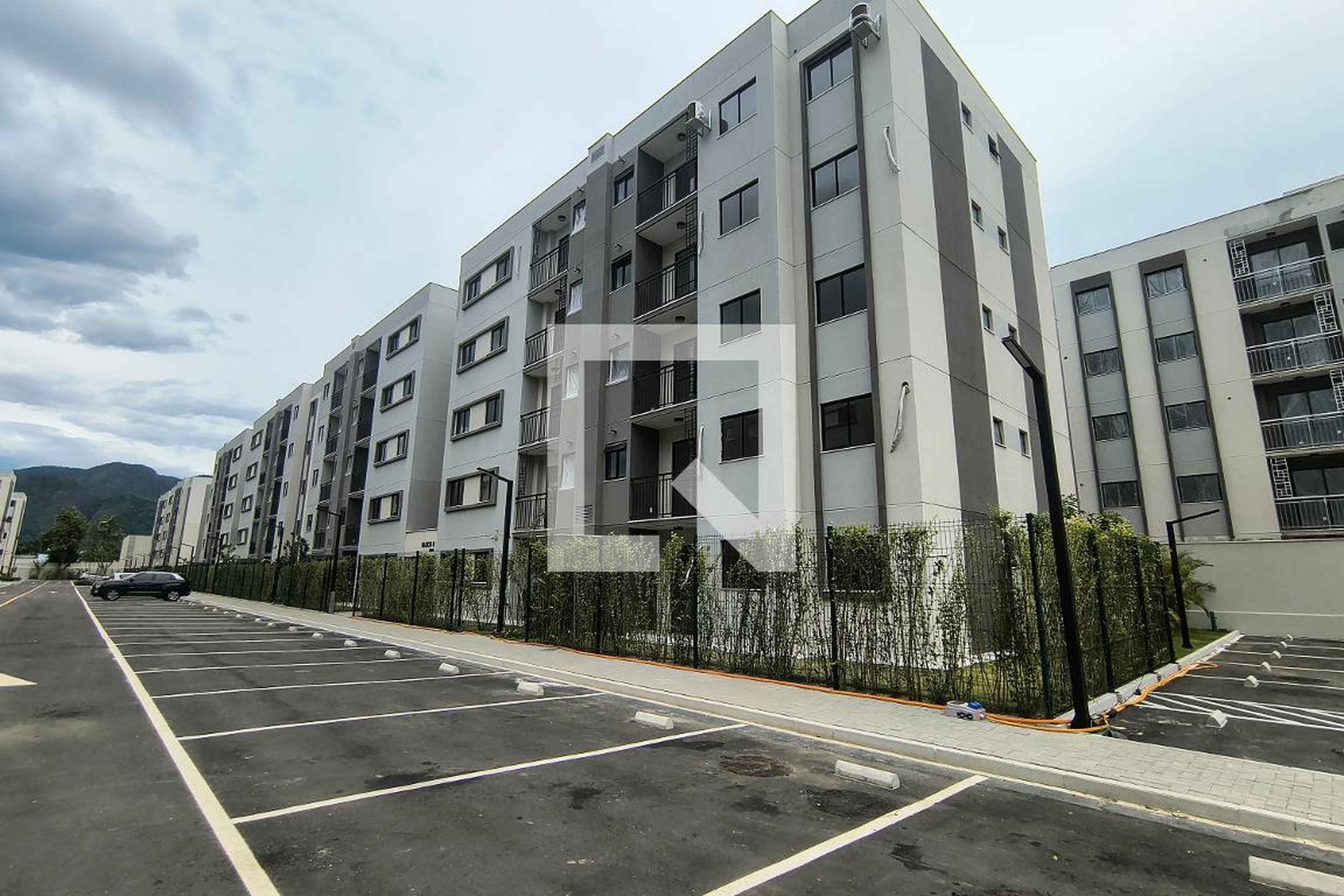 Fachada do condomínio Condomínio Living Parque Jardim  Orquídea