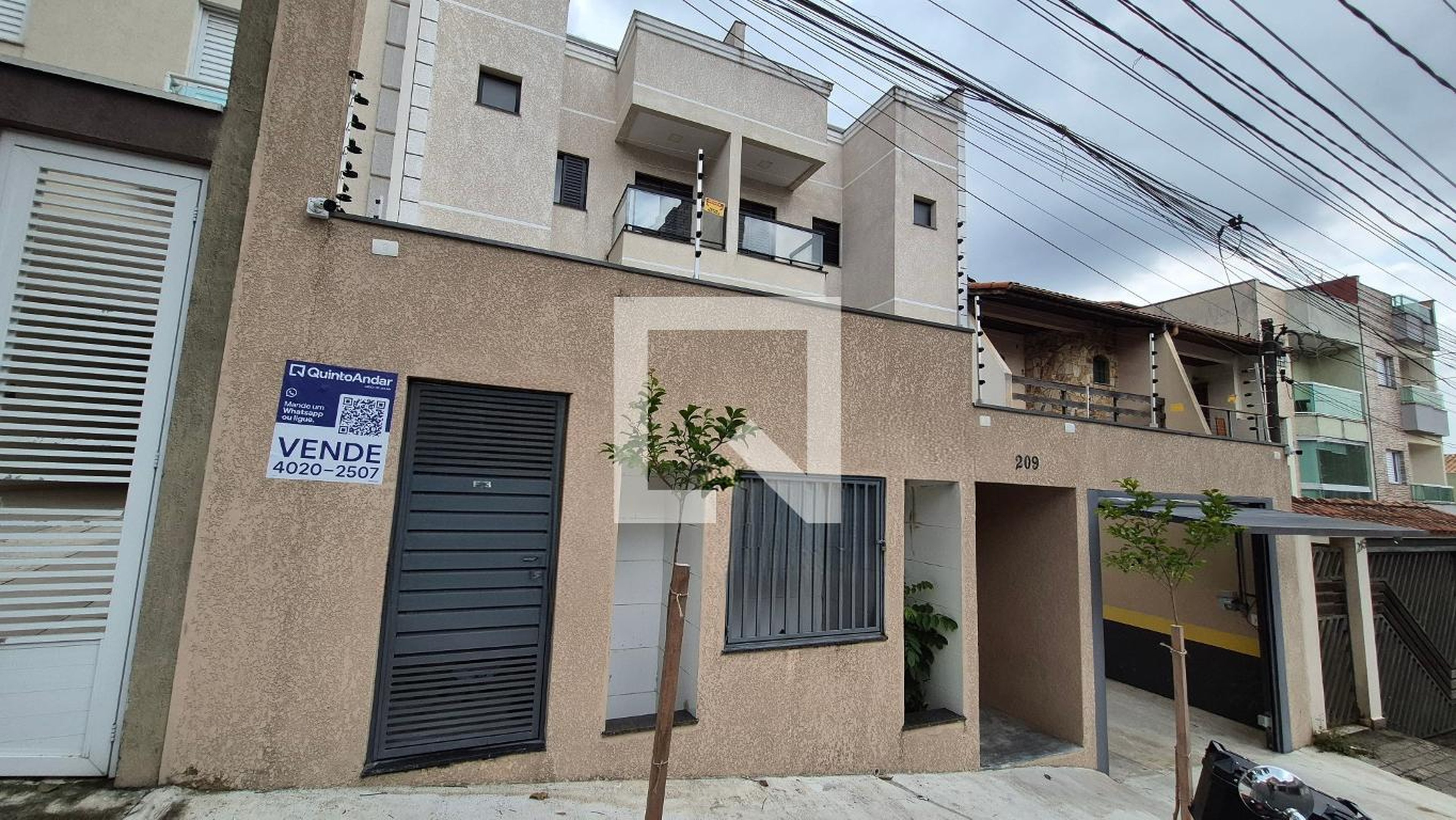 Fachada Condomínio em Rua Francisco Otaviano, 209