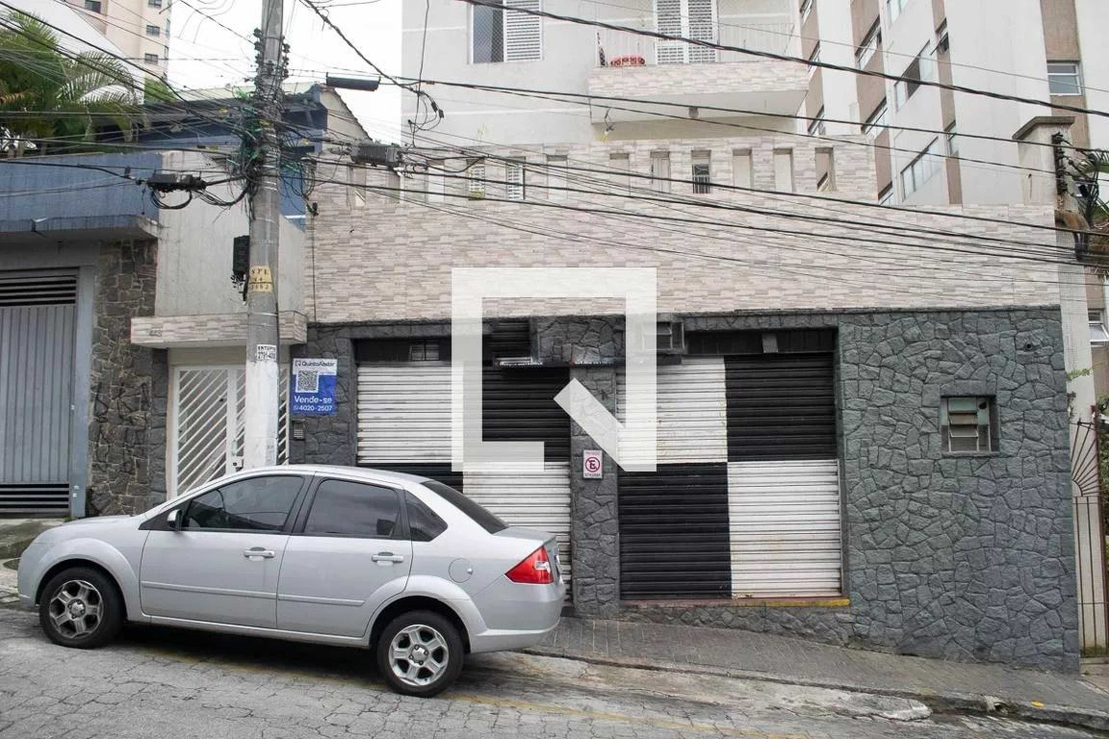 Fachada Condomínio em Rua Joaquim Norberto, 448