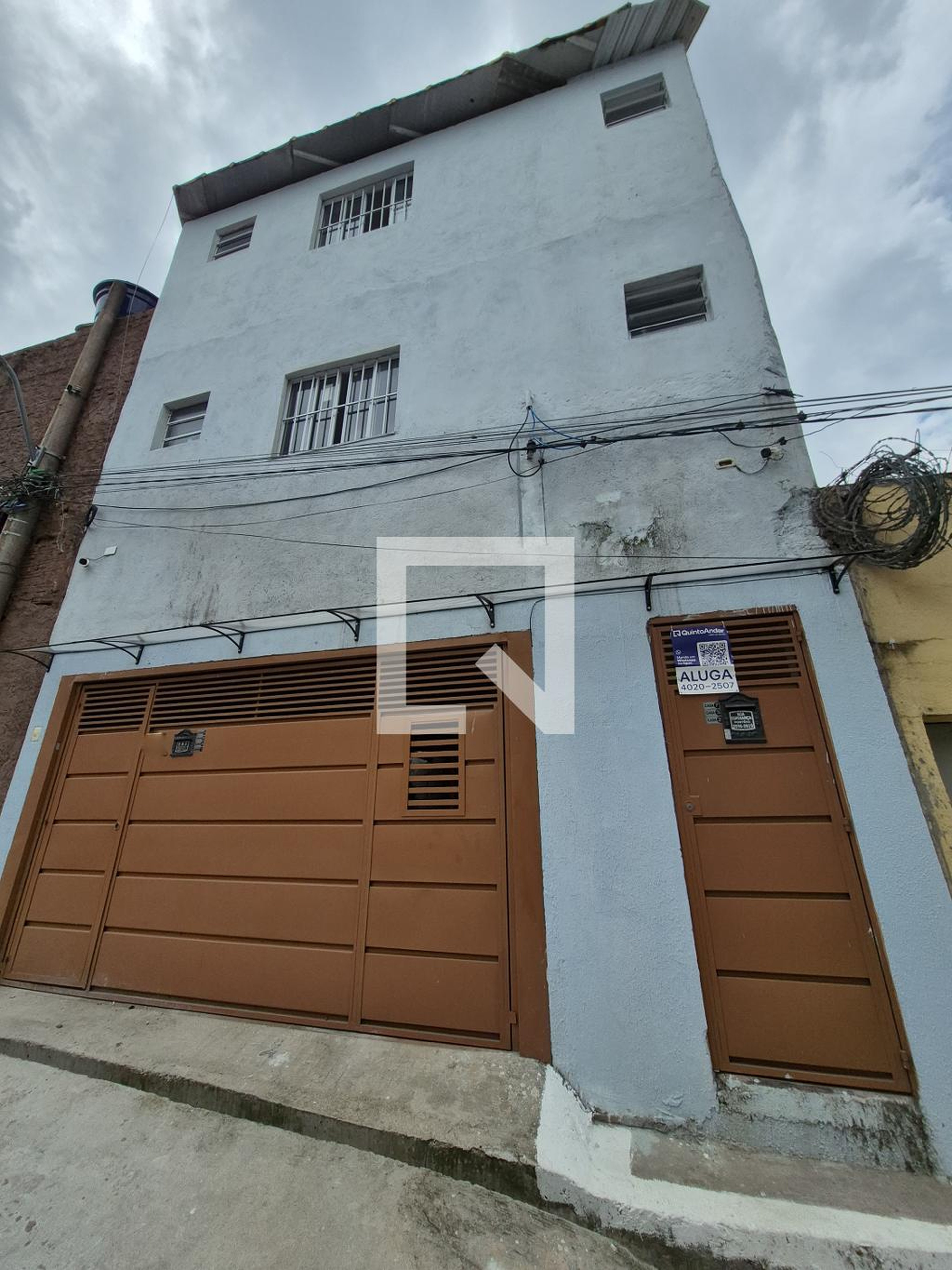 Fachada Condomínio em Rua Surucuás, 348