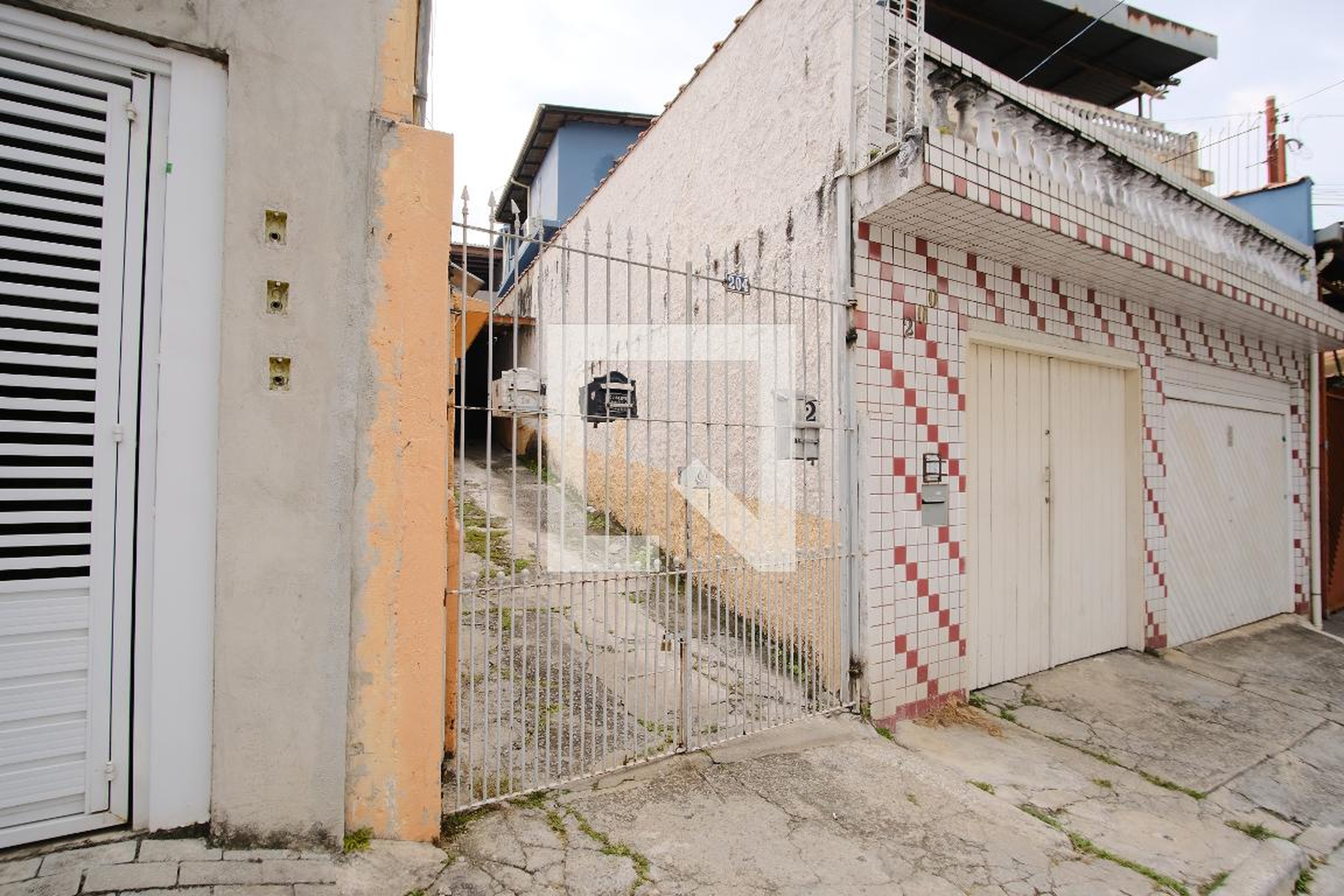 Fachada Condomínio em Rua Santo Antero, 204