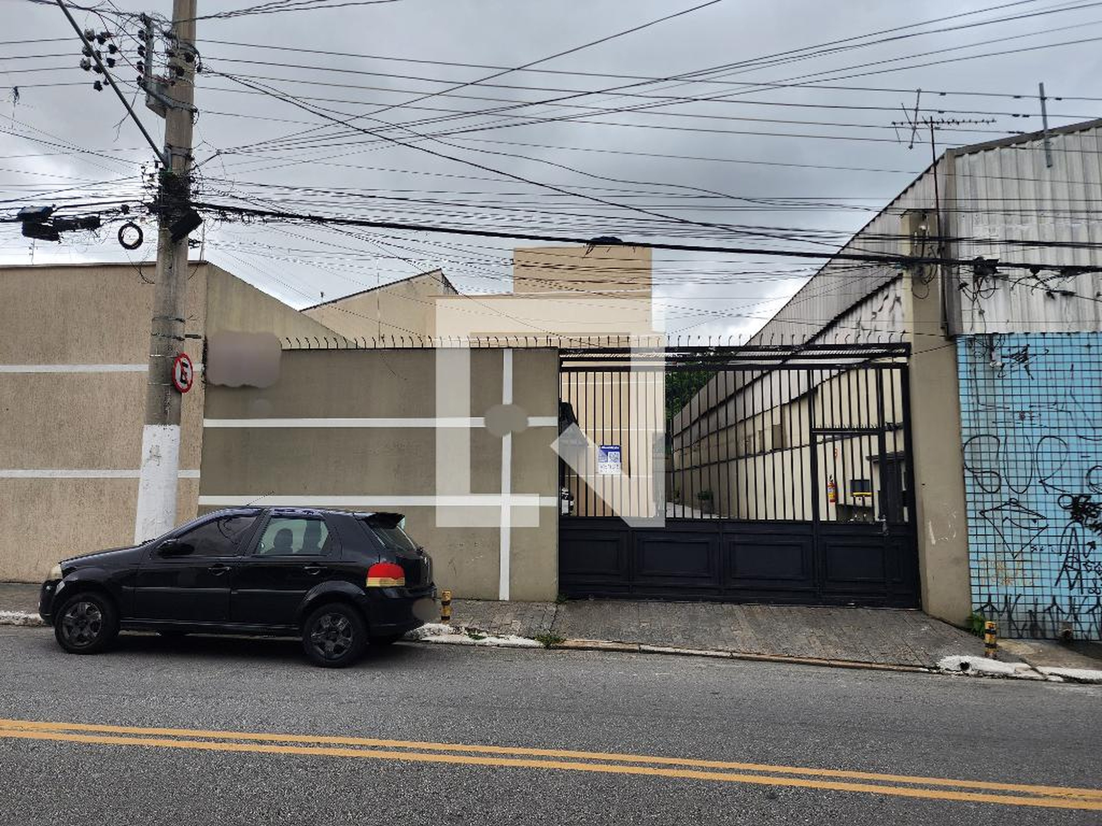 Fachada Condomínio em Rua Cirene de Oliveira Laet, 609