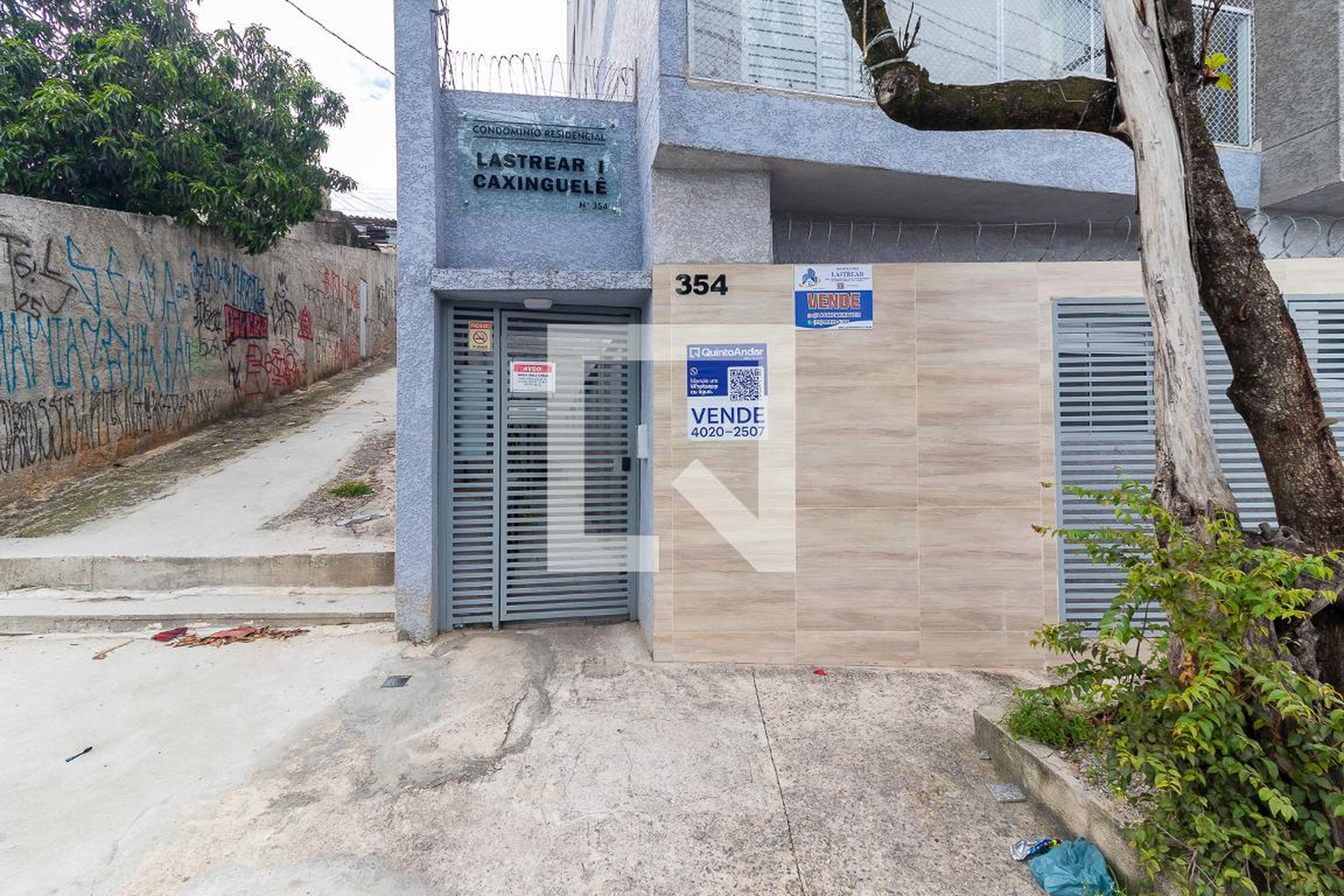 Fachada Condomínio em Rua Caxinguelé, 354