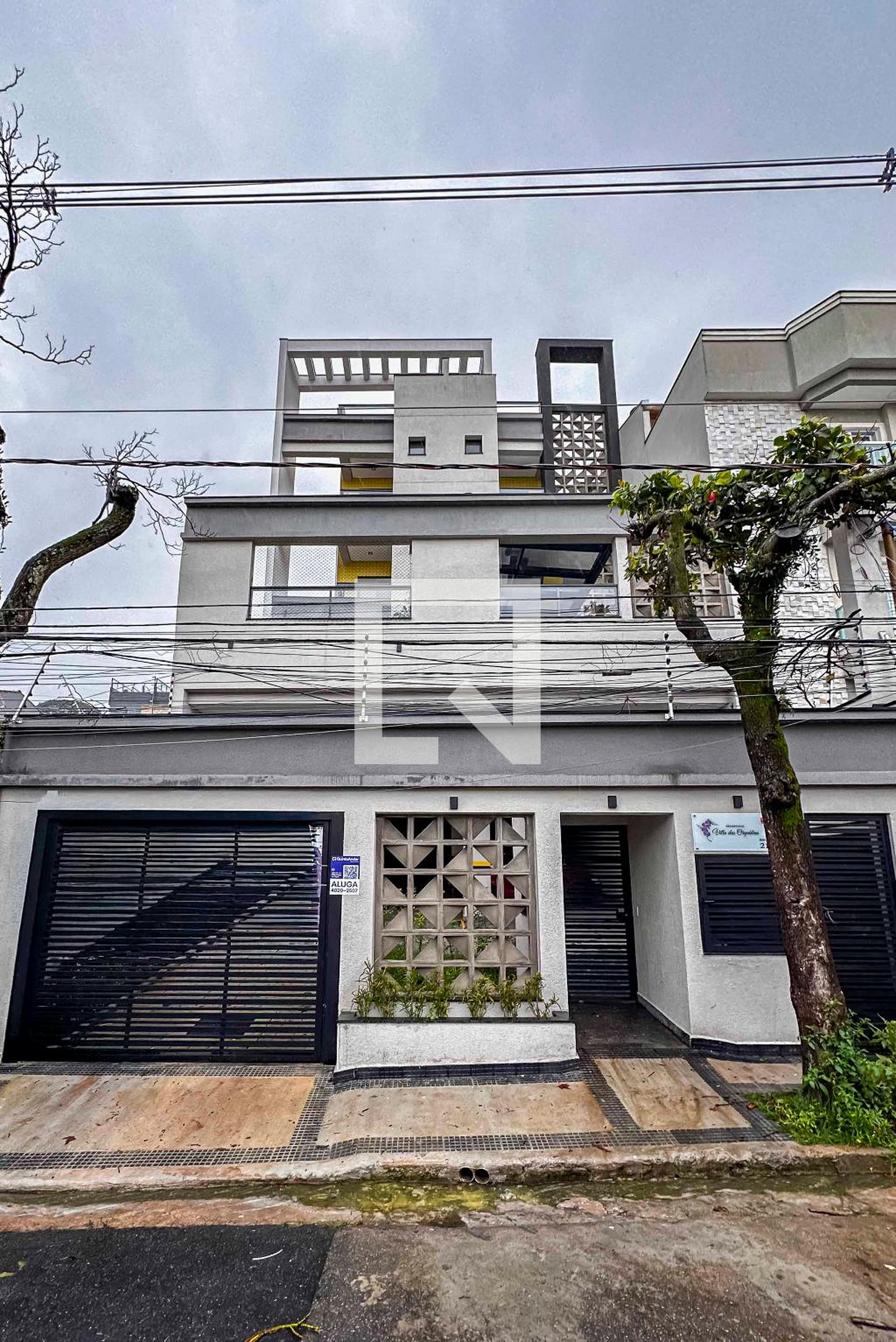 Fachada Condomínio Res Vila das Orquidias